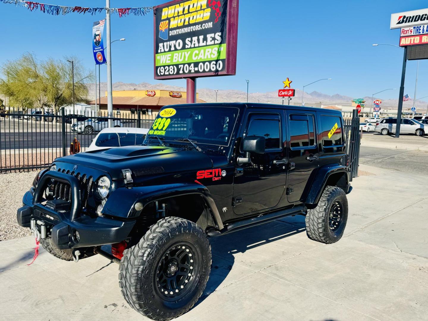 2014 Black Jeep Wrangler Unlimited Rubicon 4WD (1C4BJWFG0EL) with an 3.6L V6 DOHC 24V FFV engine, located at 2190 Hwy 95, Bullhead City, AZ, 86442, (928) 704-0060, 0.000000, 0.000000 - 2014 Jeep wrangler Rubicon. Automatic 4x4. hard top. carbon custom hood. 4 in lift kit with 33 in tires. Lots of extras, full size spare, on board compressor. satellite radio, leather, navigation. Top of the line for jeeps. v6. 110k miles. In excellent shape. free and clear title. Financing availabl - Photo#6