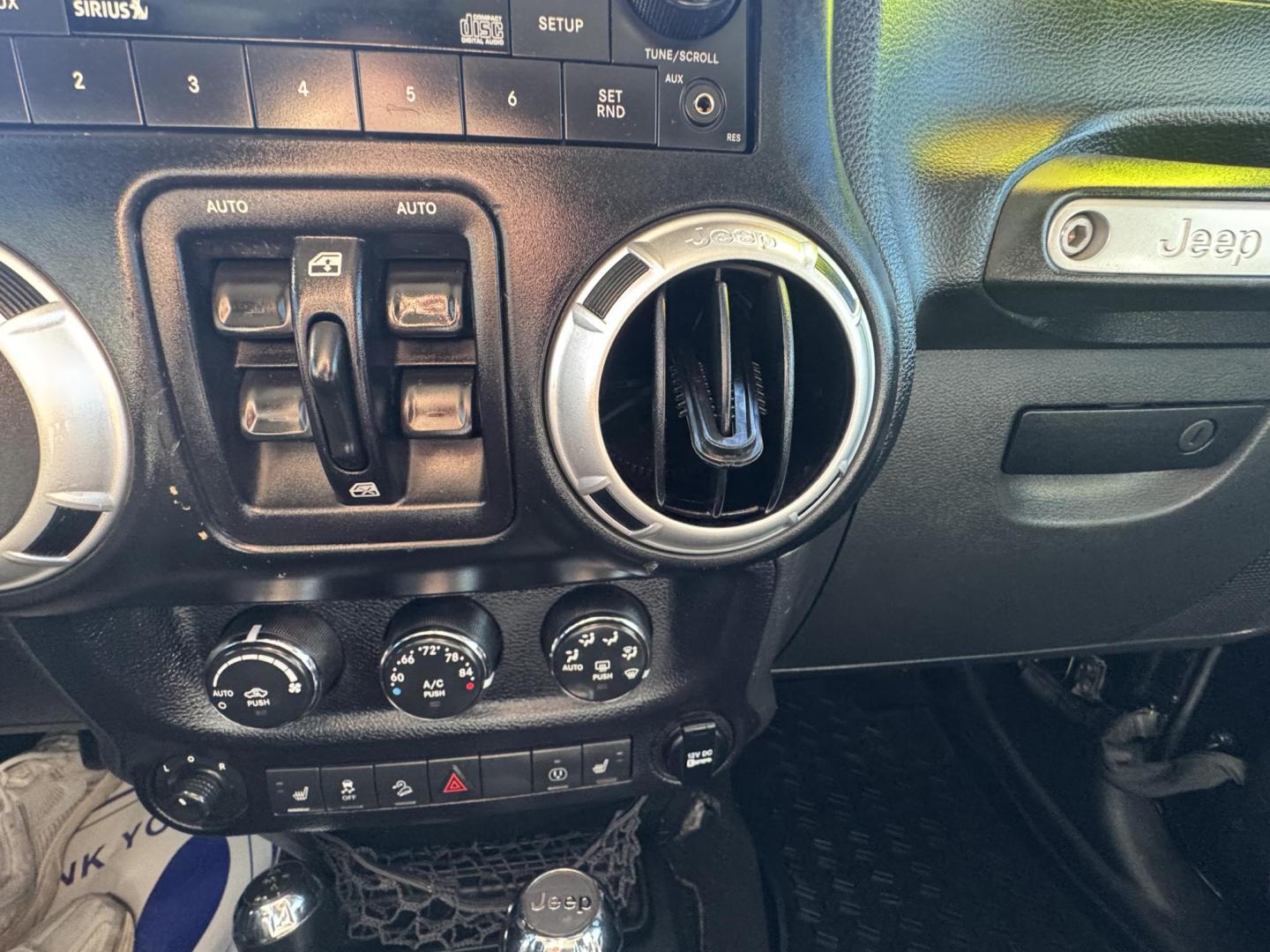 2014 Black Jeep Wrangler Unlimited Rubicon 4WD (1C4BJWFG0EL) with an 3.6L V6 DOHC 24V FFV engine, located at 2190 Hwy 95, Bullhead City, AZ, 86442, (928) 704-0060, 0.000000, 0.000000 - 2014 Jeep wrangler Rubicon. Automatic 4x4. hard top. carbon custom hood. 4 in lift kit with 33 in tires. Lots of extras, full size spare, on board compressor. satellite radio, leather, navigation. Top of the line for jeeps. v6. 110k miles. In excellent shape. free and clear title. Financing availabl - Photo#13