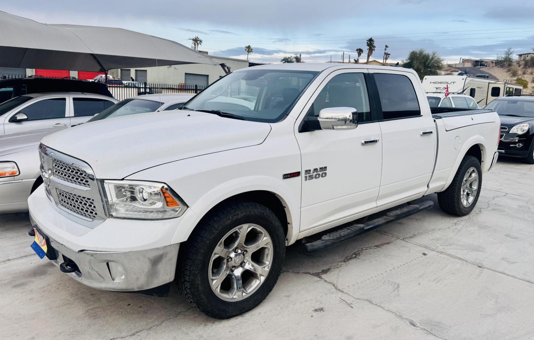 2016 White Ram 1500 , located at 2190 Hwy 95, Bullhead City, AZ, 86442, (928) 704-0060, 0.000000, 0.000000 - 2016 Ram 1500 4x4. Laramie. Leather loaded. diesel 3.0 v6. ram box. bluetooth, heated seats. navigation. weathertech floor guards. Free and clear title. On consignment. financing available. 127k miles. vin 1C6RR7VM6GS358954 - Photo#0