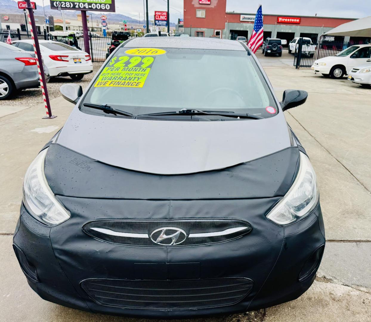 2016 grey Hyundai Accent SE 5-Door 6A (KMHCT5AEXGU) with an 1.6L L4 DOHC 16V engine, 6A transmission, located at 2190 Hwy 95, Bullhead City, AZ, 86442, (928) 704-0060, 0.000000, 0.000000 - 2016 hyundai accent Se. Brand new tires. completely serviced . 118k miles. in house financing available. - Photo#1