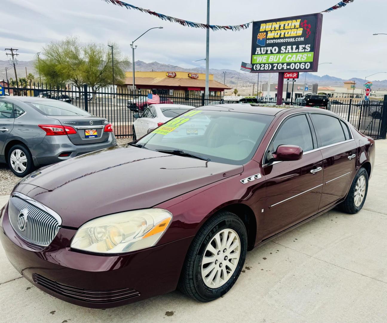2007 Burgundy Buick Lucerne CX (1G4HP57257U) with an 3.8L V6 OHV 12V engine, 4-Speed Automatic Overdrive transmission, located at 2190 Hwy 95, Bullhead City, AZ, 86442, (928) 704-0060, 0.000000, 0.000000 - 2007 Buick Lucerne CX.3.8 V6. automatic , power windows locks, ice cold a/c. Brand new tires. completely serviced. Clean carfax . Arizona title. Free warranty. In house financing. - Photo#0