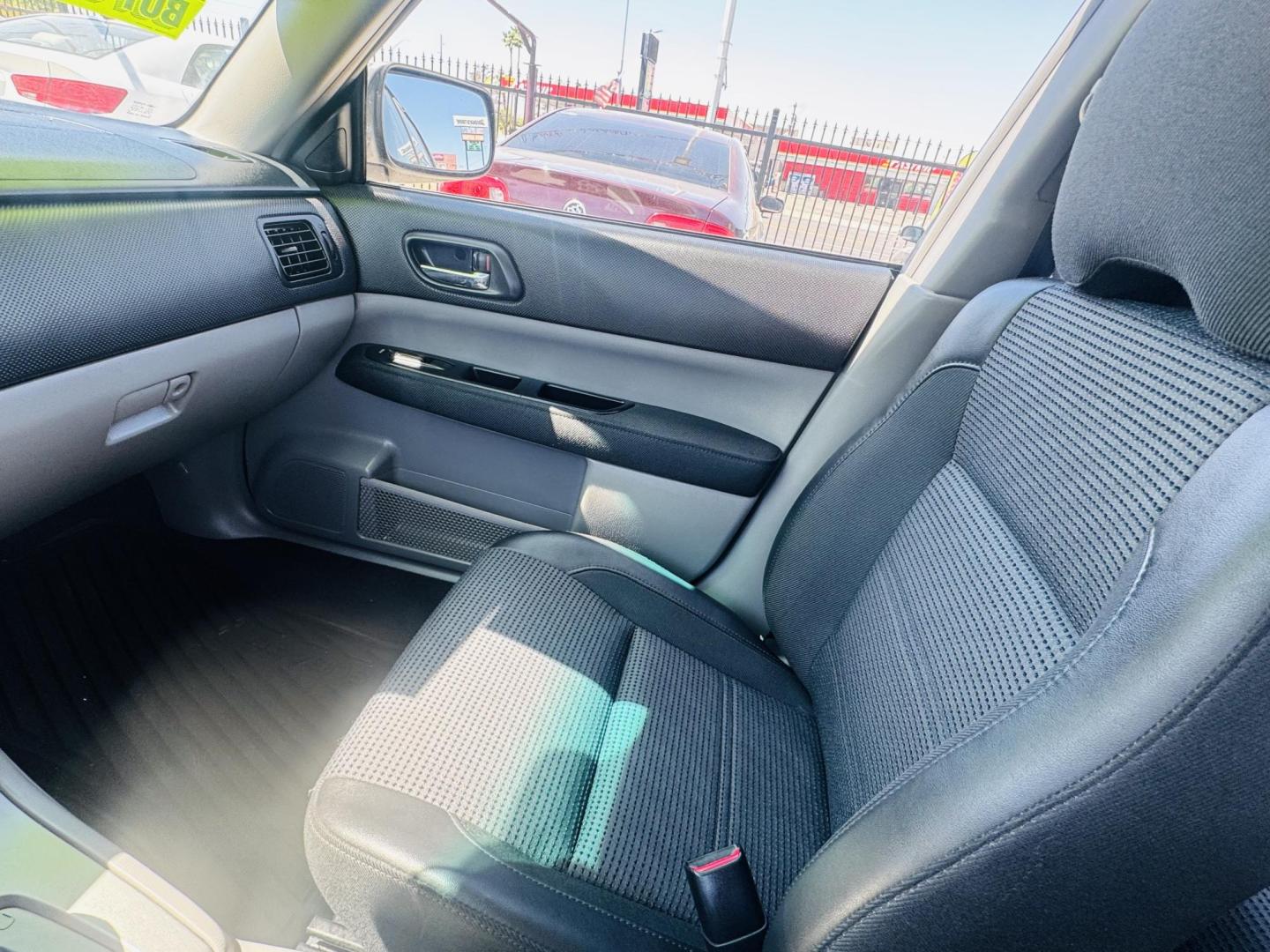 2005 Black Subaru Forester 2.5 XT (JF1SG69625H) with an 2.5L H4 DOHC 16V TURBO engine, 4-Speed Automatic Overdrive transmission, located at 2190 Hwy 95, Bullhead City, AZ, 86442, (928) 704-0060, 0.000000, 0.000000 - 2005 Subaru Forester lX. all wheel drive wagon . Has had replacement of transmission with a free warranty, free carfax. Runs and drives great. Brand new tires. Only at Dunton Motors. 142k miles. heated seats. super clean. In house financing. Buy Here Pay Here. We finance - Photo#9