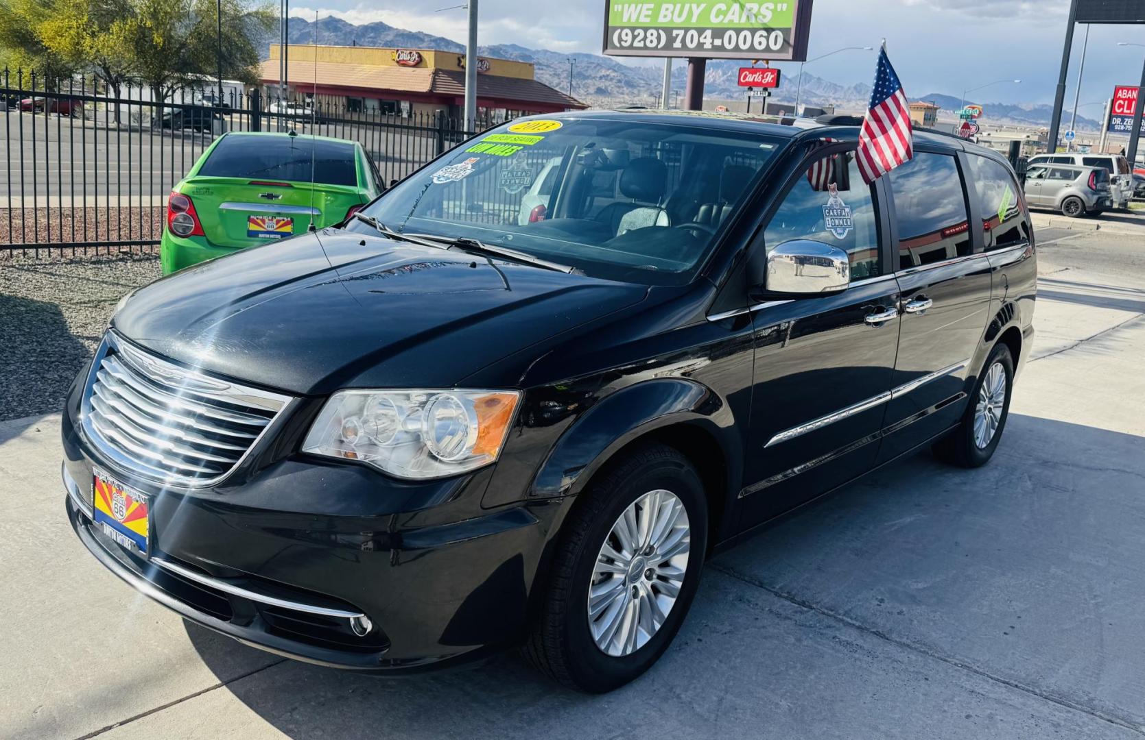 2013 grey Chrysler Town & Country Touring-L (2C4RC1CGXDR) with an 3.6L V6 DOHC 24V engine, 6-Speed Automatic transmission, located at 2190 Hwy 95, Bullhead City, AZ, 86442, (928) 704-0060, 0.000000, 0.000000 - 1 owner . Leather 3 tvs , dvd player . Backup camera . Fully loaded. Power side doors . Power 3 rd row seat . Headphones . Fully loaded . 2 sets of keys owners Manual . Free CARFAX . Free warranty . Arizona van excellent condition. - Photo#2