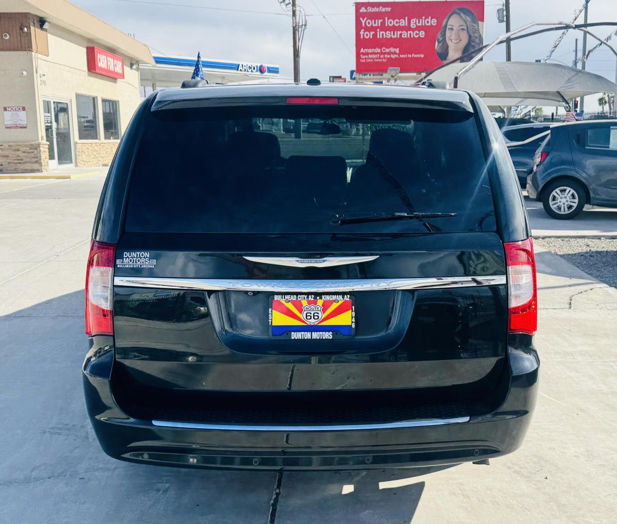 2013 grey Chrysler Town & Country Touring-L (2C4RC1CGXDR) with an 3.6L V6 DOHC 24V engine, 6-Speed Automatic transmission, located at 2190 Hwy 95, Bullhead City, AZ, 86442, (928) 704-0060, 0.000000, 0.000000 - 1 owner . Leather 3 tvs , dvd player . Backup camera . Fully loaded. Power side doors . Power 3 rd row seat . Headphones . Fully loaded . 2 sets of keys owners Manual . Free CARFAX . Free warranty . Arizona van excellent condition. - Photo#3