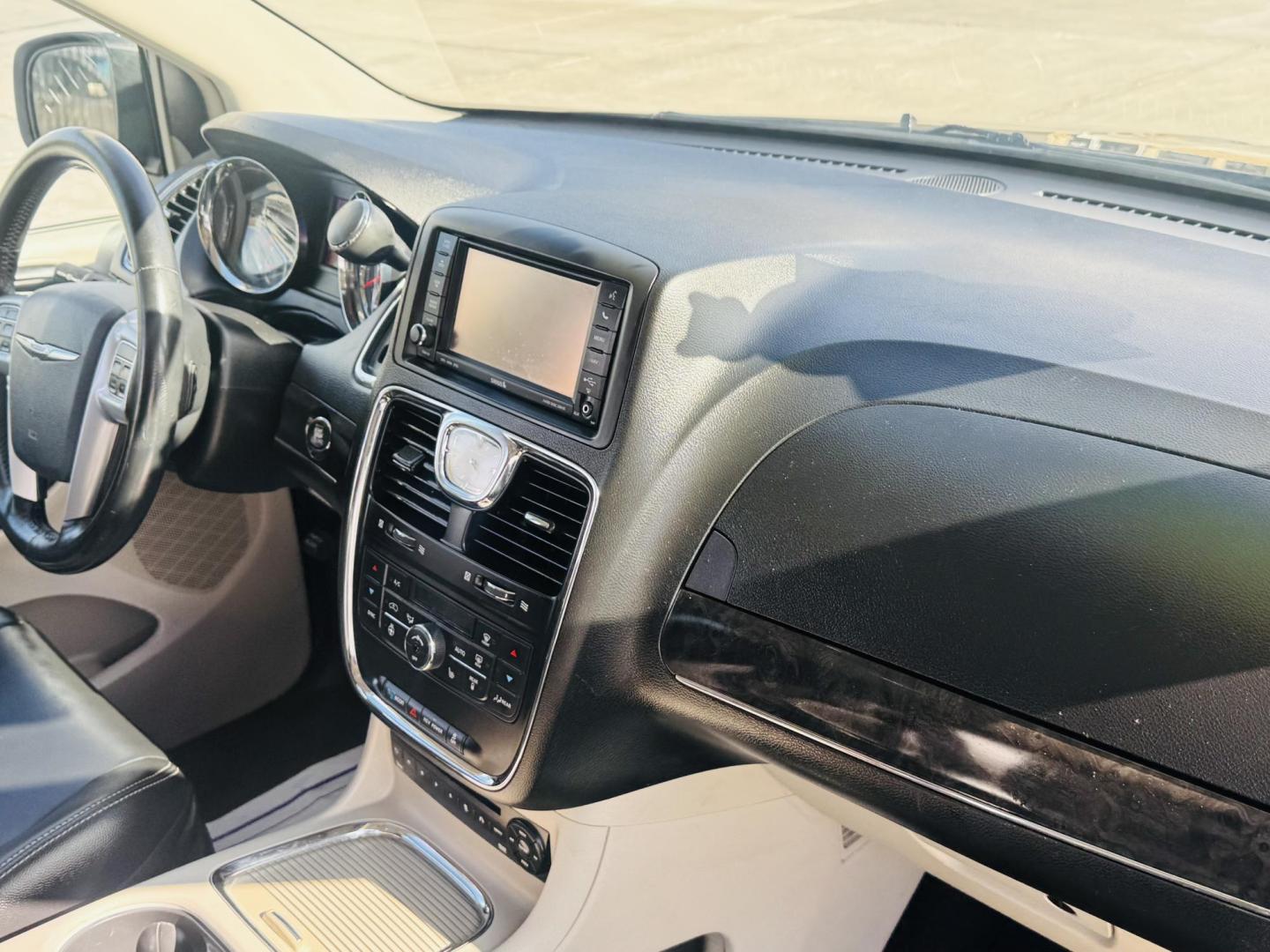 2013 grey Chrysler Town & Country Touring-L (2C4RC1CGXDR) with an 3.6L V6 DOHC 24V engine, 6-Speed Automatic transmission, located at 2190 Hwy 95, Bullhead City, AZ, 86442, (928) 704-0060, 0.000000, 0.000000 - 1 owner . Leather 3 tvs , dvd player . Backup camera . Fully loaded. Power side doors . Power 3 rd row seat . Headphones . Fully loaded . 2 sets of keys owners Manual . Free CARFAX . Free warranty . Arizona van excellent condition. - Photo#7