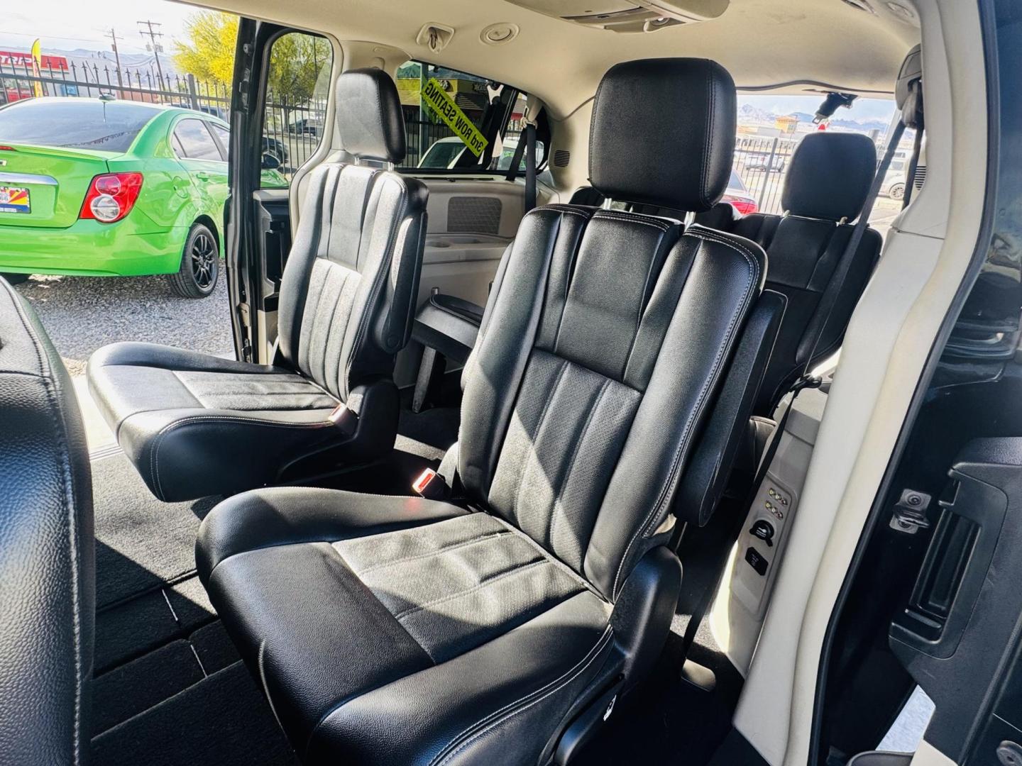 2013 grey Chrysler Town & Country Touring-L (2C4RC1CGXDR) with an 3.6L V6 DOHC 24V engine, 6-Speed Automatic transmission, located at 2190 Hwy 95, Bullhead City, AZ, 86442, (928) 704-0060, 0.000000, 0.000000 - 1 owner . Leather 3 tvs , dvd player . Backup camera . Fully loaded. Power side doors . Power 3 rd row seat . Headphones . Fully loaded . 2 sets of keys owners Manual . Free CARFAX . Free warranty . Arizona van excellent condition. - Photo#8