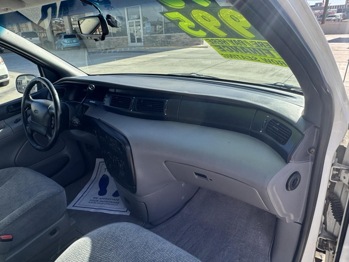 1995 White Ford Windstar GL (2FMDA5146SB) with an 3.8L V6 OHV 12V engine, 4-Speed Automatic Overdrive transmission, located at 2190 Hwy 95, Bullhead City, AZ, 86442, (928) 704-0060, 0.000000, 0.000000 - 1995 ford Windstar LX. In very good condition cold ac power windows locks free CARFAX free warranty . In house financing new tires . 3.8v6 engine - Photo#9