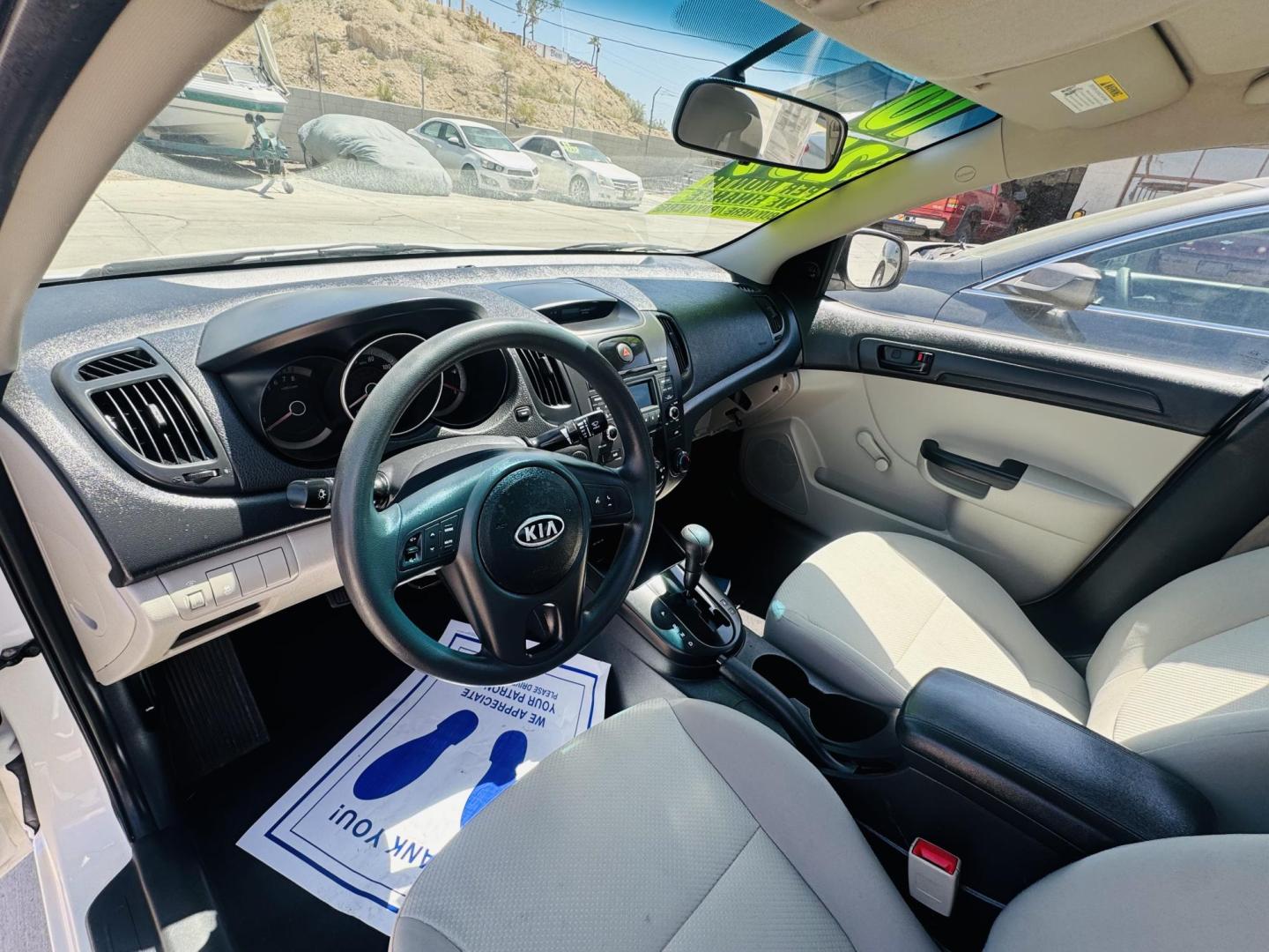 2010 White Kia Forte LX , located at 2190 Hwy 95, Bullhead City, AZ, 86442, (928) 704-0060, 0.000000, 0.000000 - 2010 Kia Forte LX. automatic . power windows locks. free carfax. free warranty. 121k miles. in house financing . buy here pay here we fiance. ice cold a/c. new tires. - Photo#7