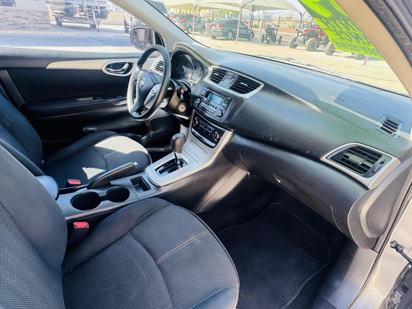 2015 grey Nissan Sentra S , located at 2190 Hwy 95, Bullhead City, AZ, 86442, (928) 704-0060, 0.000000, 0.000000 - 2015 Nissan Sentra S. completely serviced. New tires. In house financing . cold /ac free warranty. Buy Here Pay Here. - Photo#8