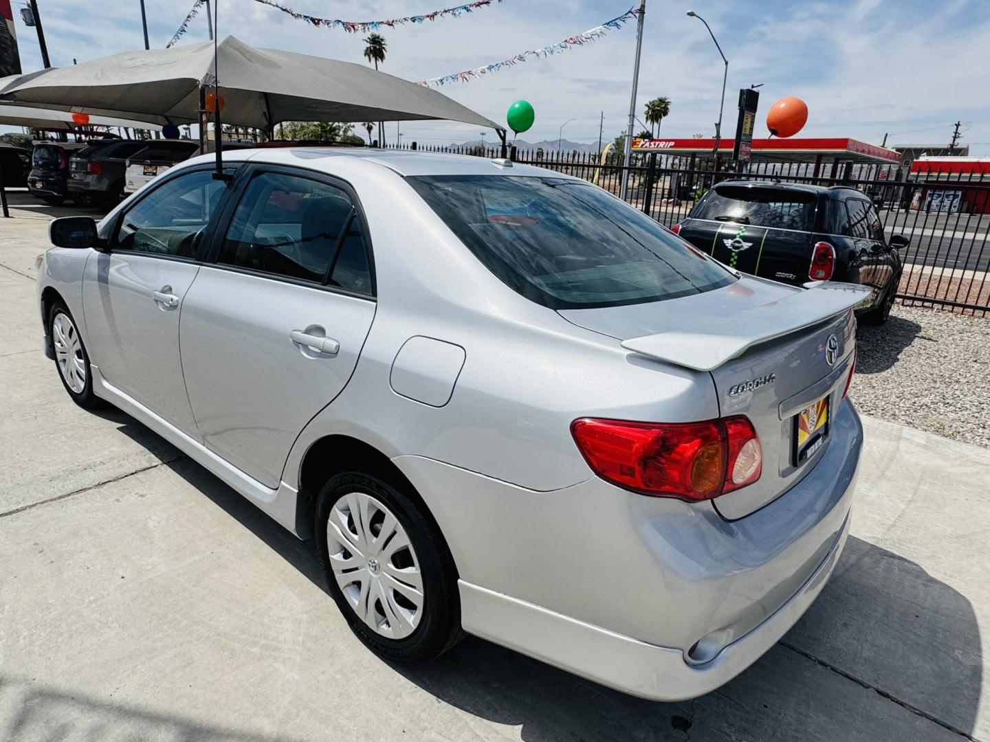 2009 Silver Toyota Corolla Base 4-Speed AT (1NXBU40E59Z) with an 1.8L L4 DOHC 16V engine, 4-Speed Automatic Overdrive transmission, located at 2190 Hwy 95, Bullhead City, AZ, 86442, (928) 704-0060, 0.000000, 0.000000 - 1 owner. 4 speed manual trans. lowered body kit. runs and drives great. free warranty. free carfax. *1 owner arizona car. great gas mileage. fun to drive. - Photo#4