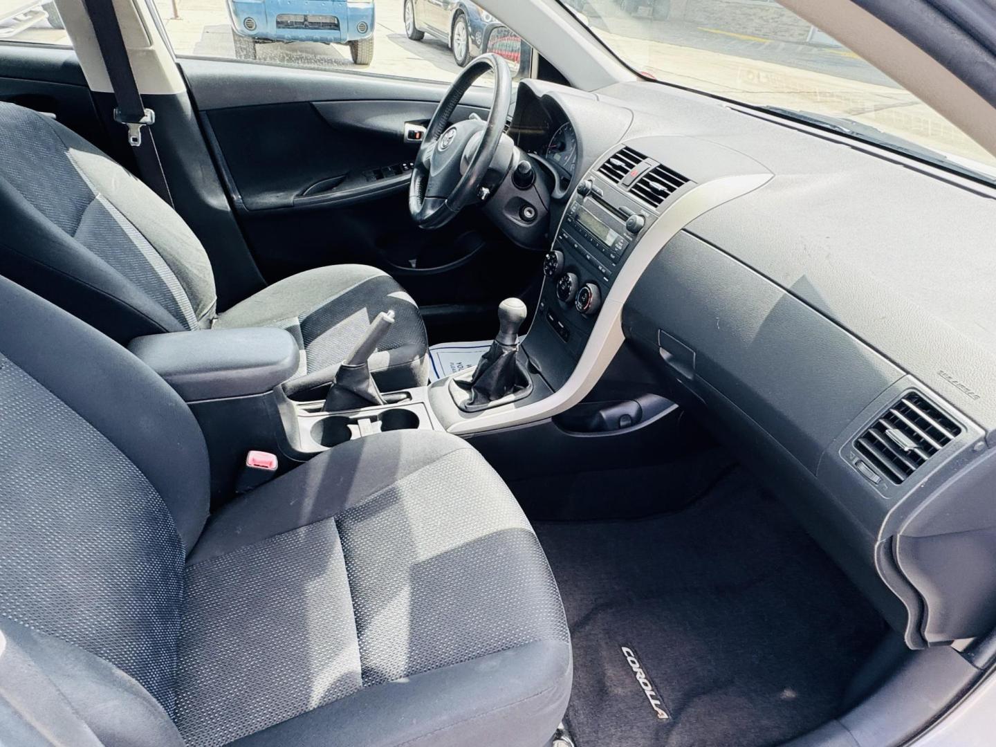 2009 Silver Toyota Corolla Base 4-Speed AT (1NXBU40E59Z) with an 1.8L L4 DOHC 16V engine, 4-Speed Automatic Overdrive transmission, located at 2190 Hwy 95, Bullhead City, AZ, 86442, (928) 704-0060, 0.000000, 0.000000 - 1 owner. 4 speed manual trans. lowered body kit. runs and drives great. free warranty. free carfax. *1 owner arizona car. great gas mileage. fun to drive. - Photo#11
