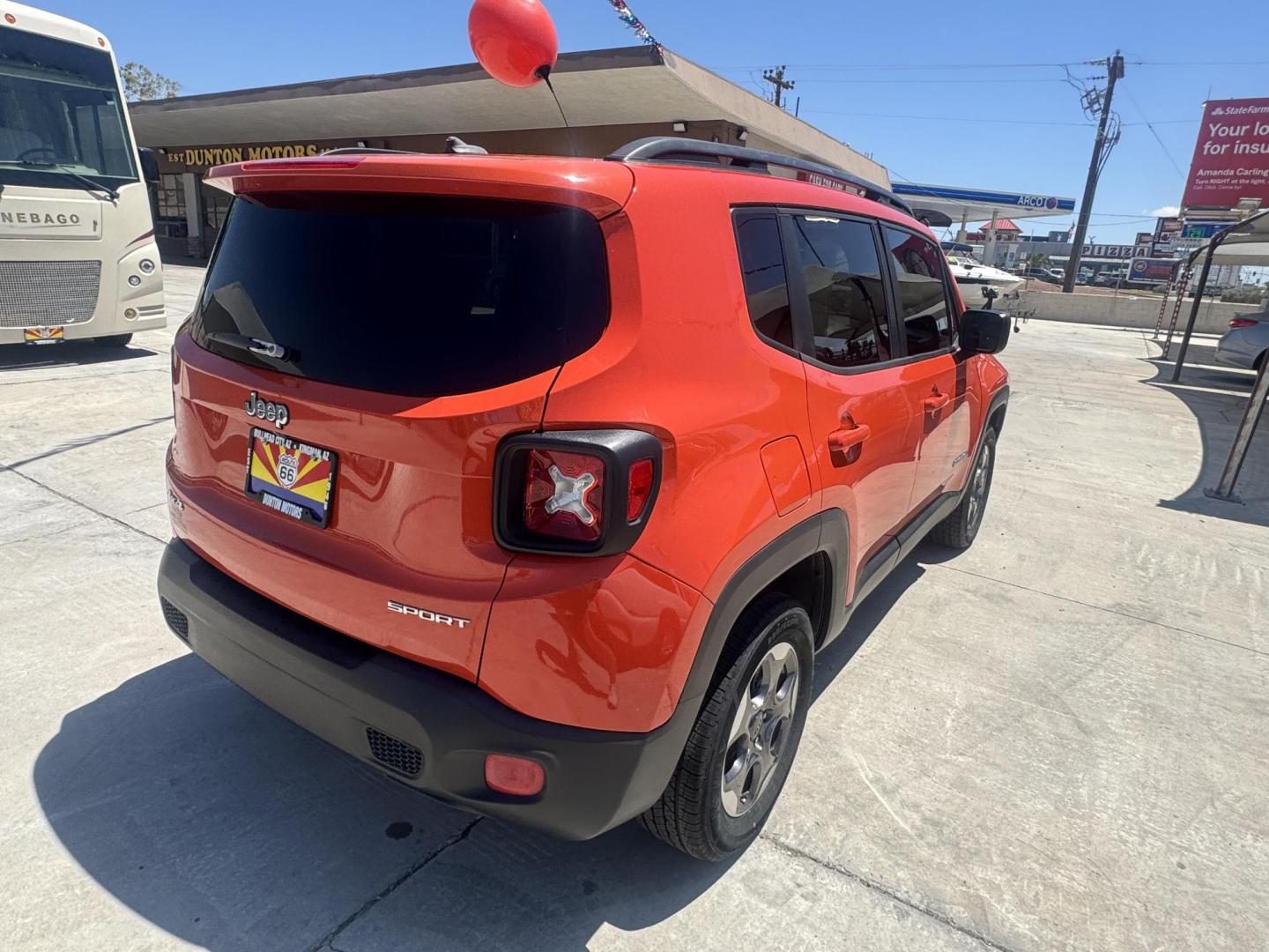 2017 Orange metallic Jeep Renegade Sport 4WD (ZACCJBAB1HP) with an 2.4L L4 DOHC 16V engine, 6M transmission, located at 2190 Hwy 95, Bullhead City, AZ, 86442, (928) 704-0060, 0.000000, 0.000000 - 1 owner. clean carfax. 4 wheel drive. financing available. free warranty. - Photo#6