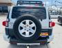 2007 Silver Toyota FJ Cruiser 4WD AT (JTEBU11F070) with an 3.4L V6 DOHC 24V engine, 5-Speed Automatic Overdrive transmission, located at 2190 Hwy 95, Bullhead City, AZ, 86442, (928) 704-0060, 0.000000, 0.000000 - On consignment. This *1 owner hard to find 2007 Toyota FJ CRuiser. in excellent condition. Professionally repainted. All service records. Custom tires/wheels. Has aftermarket rack. bumpers etc. No accidents. Non smoker. One of the best suvs ever for off roading. Free and clear Arizona title. Only at - Photo#4