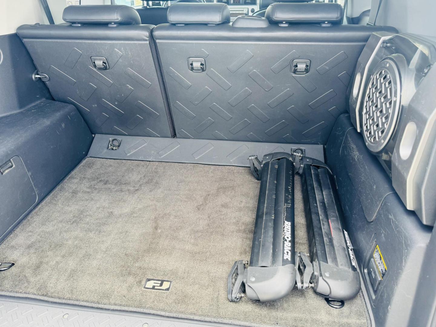 2007 Silver Toyota FJ Cruiser 4WD AT (JTEBU11F070) with an 3.4L V6 DOHC 24V engine, 5-Speed Automatic Overdrive transmission, located at 2190 Hwy 95, Bullhead City, AZ, 86442, (928) 704-0060, 0.000000, 0.000000 - On consignment. This *1 owner hard to find 2007 Toyota FJ CRuiser. in excellent condition. Professionally repainted. All service records. Custom tires/wheels. Has aftermarket rack. bumpers etc. No accidents. Non smoker. One of the best suvs ever for off roading. Free and clear Arizona title. Only at - Photo#6