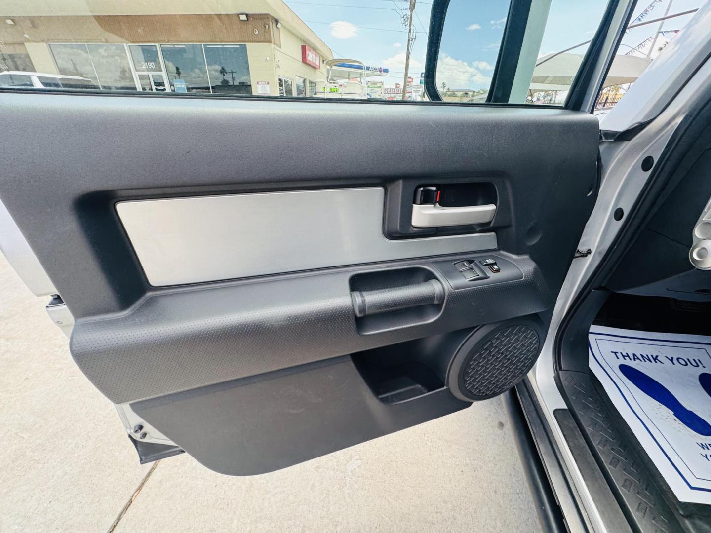 2007 Silver Toyota FJ Cruiser 4WD AT (JTEBU11F070) with an 3.4L V6 DOHC 24V engine, 5-Speed Automatic Overdrive transmission, located at 2190 Hwy 95, Bullhead City, AZ, 86442, (928) 704-0060, 0.000000, 0.000000 - On consignment. This *1 owner hard to find 2007 Toyota FJ CRuiser. in excellent condition. Professionally repainted. All service records. Custom tires/wheels. Has aftermarket rack. bumpers etc. No accidents. Non smoker. One of the best suvs ever for off roading. Free and clear Arizona title. Only at - Photo#16