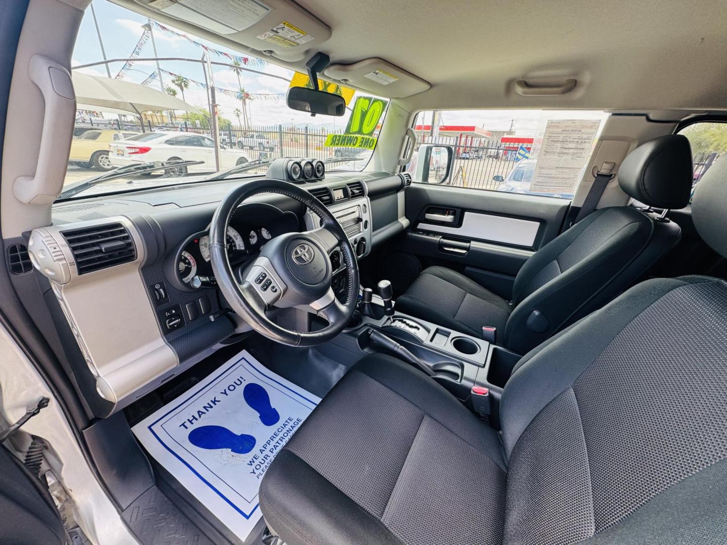 2007 Silver Toyota FJ Cruiser 4WD AT (JTEBU11F070) with an 3.4L V6 DOHC 24V engine, 5-Speed Automatic Overdrive transmission, located at 2190 Hwy 95, Bullhead City, AZ, 86442, (928) 704-0060, 0.000000, 0.000000 - On consignment. This *1 owner hard to find 2007 Toyota FJ CRuiser. in excellent condition. Professionally repainted. All service records. Custom tires/wheels. Has aftermarket rack. bumpers etc. No accidents. Non smoker. One of the best suvs ever for off roading. Free and clear Arizona title. Only at - Photo#22