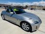 2004 Silver /black Nissan 350Z Enthusiast Roadster (JN1AZ36A74T) with an 3.5L V6 DOHC 24V engine, 6-Speed Manual Overdrive transmission, located at 2190 Hwy 95, Bullhead City, AZ, 86442, (928) 704-0060, 0.000000, 0.000000 - 2007 Nissan 350 Z convertible. Automatic . 2 owner clean carfax. Only !!!!! 25,425 original miles. Always garaged. in excellent condition. Automatic trans, electric power convertible top. tires 1 year old look like new. All maintenance records. What an amazing super clean low mileage fun car. Only - Photo#11