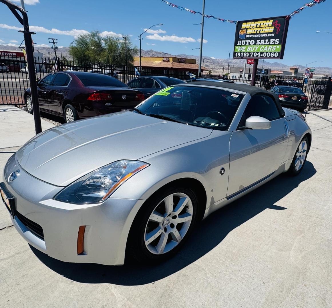 2004 Silver /black Nissan 350Z Enthusiast Roadster (JN1AZ36A74T) with an 3.5L V6 DOHC 24V engine, 6-Speed Manual Overdrive transmission, located at 2190 Hwy 95, Bullhead City, AZ, 86442, (928) 704-0060, 0.000000, 0.000000 - 2007 Nissan 350 Z convertible. Automatic . 2 owner clean carfax. Only !!!!! 25,425 original miles. Always garaged. in excellent condition. Automatic trans, electric power convertible top. tires 1 year old look like new. All maintenance records. What an amazing super clean low mileage fun car. Only - Photo#13