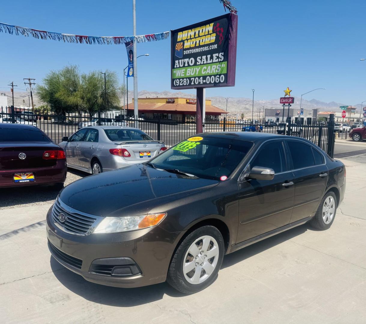 2009 Kia Optima EX (KNAGE228695) with an 2.4L L4 DOHC 16V engine, 4-Speed Automatic transmission, located at 2190 Hwy 95, Bullhead City, AZ, 86442, (928) 704-0060, 0.000000, 0.000000 - Photo#3