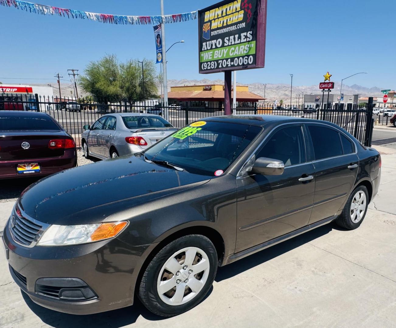 2009 Kia Optima EX (KNAGE228695) with an 2.4L L4 DOHC 16V engine, 4-Speed Automatic transmission, located at 2190 Hwy 95, Bullhead City, AZ, 86442, (928) 704-0060, 0.000000, 0.000000 - Photo#5
