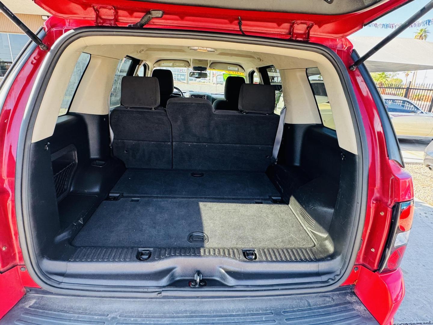 2009 Red Ford Explorer XLT 4.0L 4WD (1FMEU73E29U) with an 4.0L V6 SOHC 16V engine, 5-Speed Automatic transmission, located at 2190 Hwy 95, Bullhead City, AZ, 86442, (928) 704-0060, 0.000000, 0.000000 - 2009 Ford Explorer xlt. 4 wheel drive. Runs great. Free carfax. Free warranty. In house financing available. - Photo#5