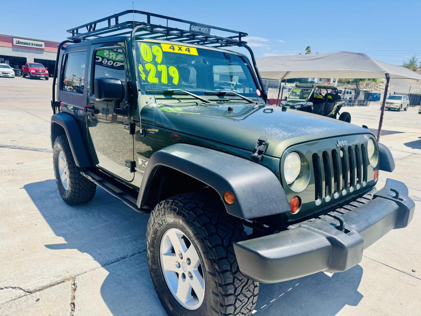2009 Jeep Wrangler X (1J4FA24169L) with an 3.8L V6 OHV 12V engine, located at 2190 Hwy 95, Bullhead City, AZ, 86442, (928) 704-0060, 0.000000, 0.000000 - 3.8 v6 automatic. hard top. custom roof rack. Ice cold a/c. in house financing available. - Photo#0