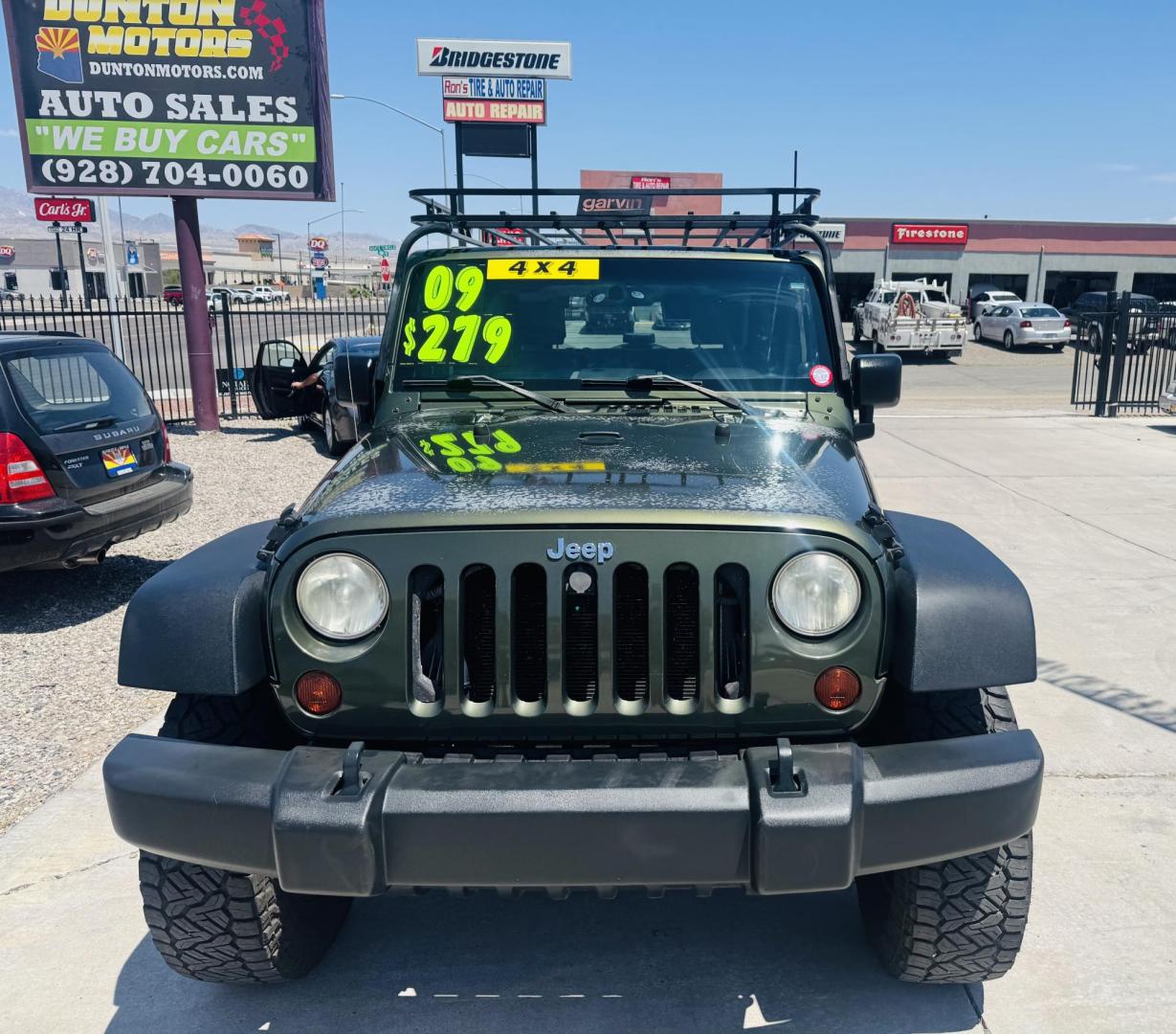2009 Jeep Wrangler X (1J4FA24169L) with an 3.8L V6 OHV 12V engine, located at 2190 Hwy 95, Bullhead City, AZ, 86442, (928) 704-0060, 0.000000, 0.000000 - 3.8 v6 automatic. hard top. custom roof rack. Ice cold a/c. in house financing available. - Photo#2