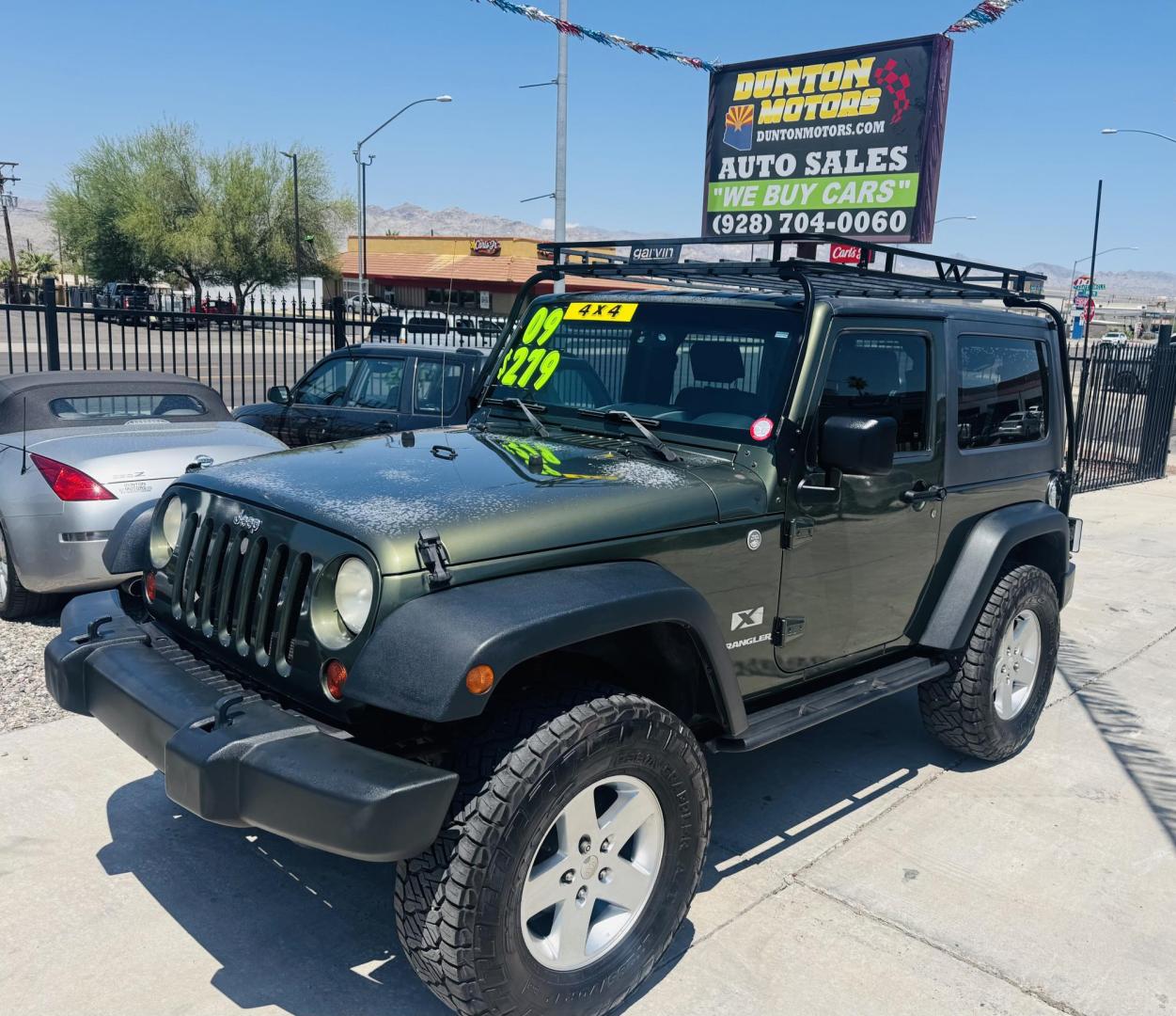 2009 Jeep Wrangler X (1J4FA24169L) with an 3.8L V6 OHV 12V engine, located at 2190 Hwy 95, Bullhead City, AZ, 86442, (928) 704-0060, 0.000000, 0.000000 - 3.8 v6 automatic. hard top. custom roof rack. Ice cold a/c. in house financing available. - Photo#1