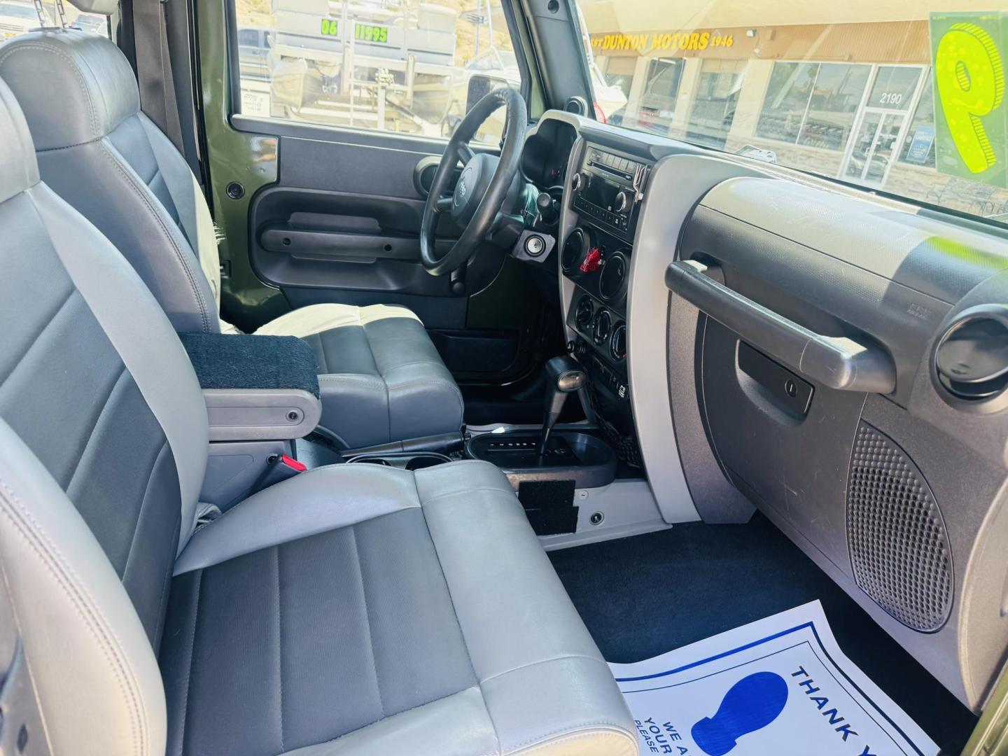 2009 Jeep Wrangler X (1J4FA24169L) with an 3.8L V6 OHV 12V engine, located at 2190 Hwy 95, Bullhead City, AZ, 86442, (928) 704-0060, 0.000000, 0.000000 - 3.8 v6 automatic. hard top. custom roof rack. Ice cold a/c. in house financing available. - Photo#4