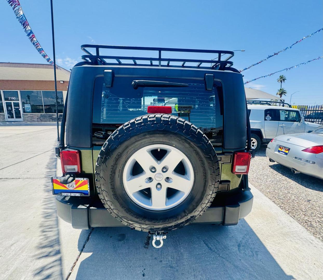 2009 Jeep Wrangler X (1J4FA24169L) with an 3.8L V6 OHV 12V engine, located at 2190 Hwy 95, Bullhead City, AZ, 86442, (928) 704-0060, 0.000000, 0.000000 - 3.8 v6 automatic. hard top. custom roof rack. Ice cold a/c. in house financing available. - Photo#7