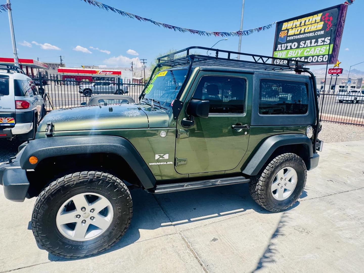 2009 Jeep Wrangler X (1J4FA24169L) with an 3.8L V6 OHV 12V engine, located at 2190 Hwy 95, Bullhead City, AZ, 86442, (928) 704-0060, 0.000000, 0.000000 - 3.8 v6 automatic. hard top. custom roof rack. Ice cold a/c. in house financing available. - Photo#8