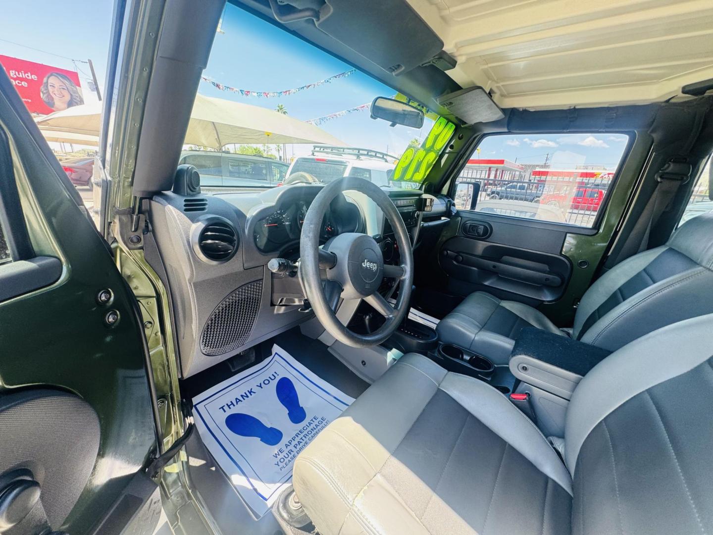 2009 Jeep Wrangler X (1J4FA24169L) with an 3.8L V6 OHV 12V engine, located at 2190 Hwy 95, Bullhead City, AZ, 86442, (928) 704-0060, 0.000000, 0.000000 - 3.8 v6 automatic. hard top. custom roof rack. Ice cold a/c. in house financing available. - Photo#11