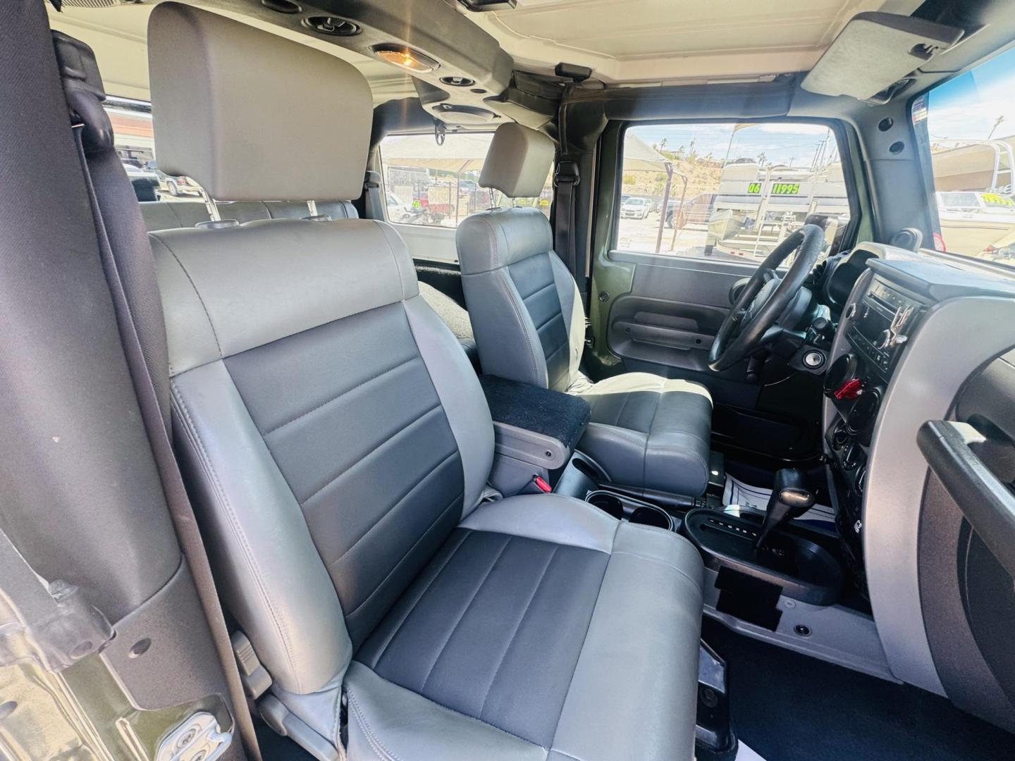 2009 Jeep Wrangler X (1J4FA24169L) with an 3.8L V6 OHV 12V engine, located at 2190 Hwy 95, Bullhead City, AZ, 86442, (928) 704-0060, 0.000000, 0.000000 - 3.8 v6 automatic. hard top. custom roof rack. Ice cold a/c. in house financing available. - Photo#15