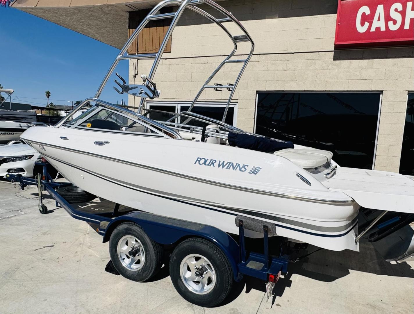 2004 White four winns Horizon 190 , located at 2190 Hwy 95, Bullhead City, AZ, 86442, (928) 704-0060, 0.000000, 0.000000 - 2004 Four winns Horizon 190. super clean 360 hours. Completely serviced. Wake board tower. bimini top . clean boat. stereo. always garaged. $13777 - Photo#9