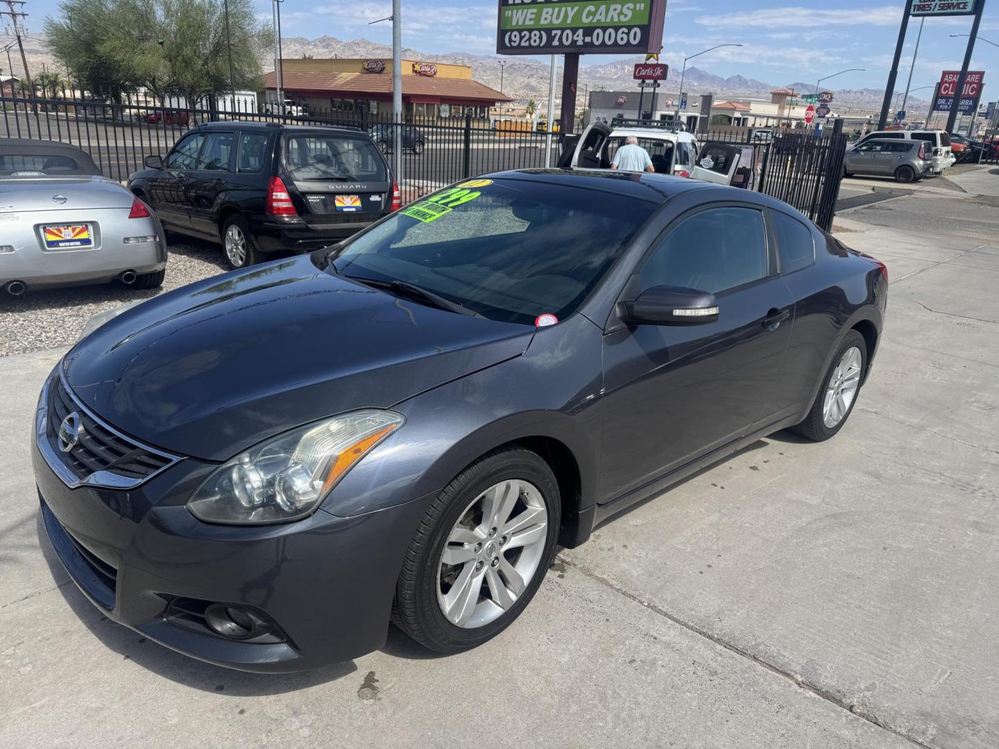 2012 Charcoal Nissan Altima 2.5 S , located at 2190 Hwy 95, Bullhead City, AZ, 86442, (928) 704-0060, 0.000000, 0.000000 - 2012 Nissan Altima 2.5 S . 105k miles .cold as . Leather , moonroof , navigation brand new tires Runs great . Free CARFAX . Free warranty . In house financing available - Photo#1