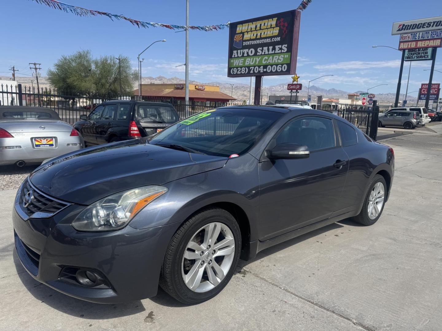 2012 Charcoal Nissan Altima 2.5 S , located at 2190 Hwy 95, Bullhead City, AZ, 86442, (928) 704-0060, 0.000000, 0.000000 - 2012 Nissan Altima 2.5 S . 105k miles .cold as . Leather , moonroof , navigation brand new tires Runs great . Free CARFAX . Free warranty . In house financing available - Photo#5