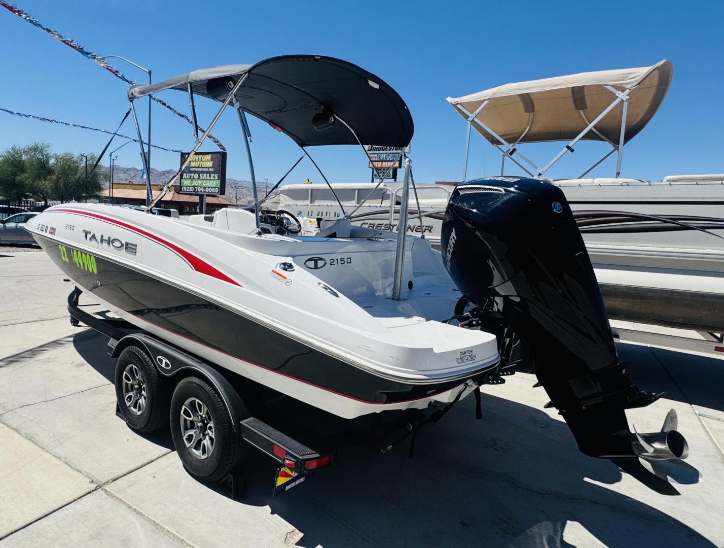 2022 White Tahoe 2150 , located at 2190 Hwy 95, Bullhead City, AZ, 86442, (928) 704-0060, 0.000000, 0.000000 - 1 owner 2022 Tahoe . Super clean custom stereo Bimini top full cover 38 hours . New tires . - Photo#2