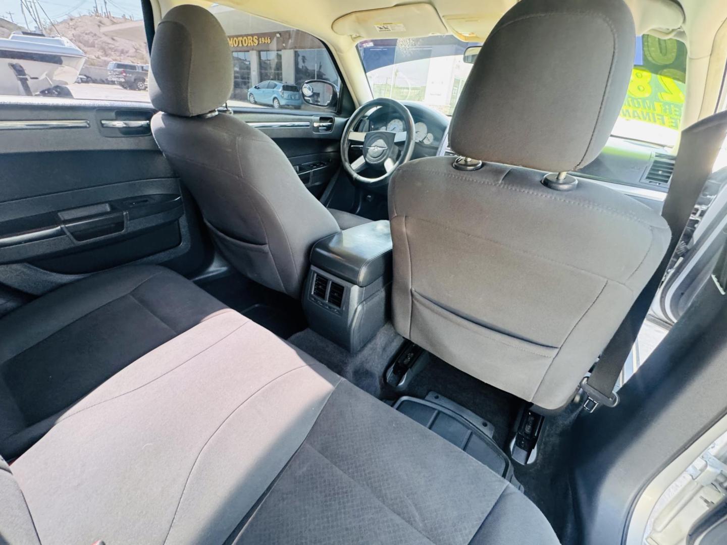 2010 Silver Chrysler 300 Touring plus , located at 2190 Hwy 95, Bullhead City, AZ, 86442, (928) 704-0060, 0.000000, 0.000000 - 2010 Chrysler 300 Touring plus. 3.5 V6. custom tinted windows. runs and drives great. Free warranty. Free carfax. We Finance. Buy Here Pay Here. 103k miles. - Photo#7