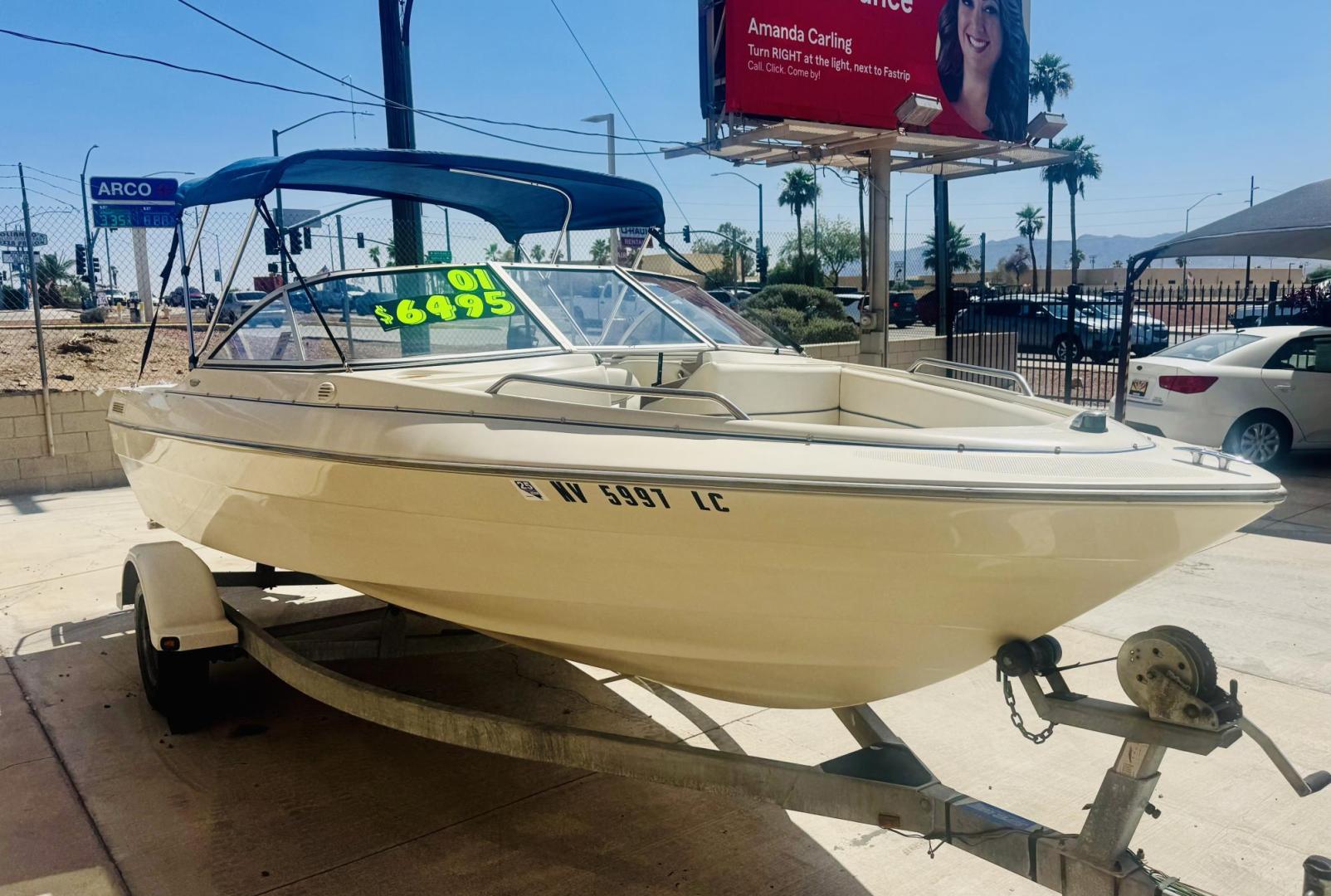 2001 White Bayliner Capri 190 , located at 2190 Hwy 95, Bullhead City, AZ, 86442, (928) 704-0060, 0.000000, 0.000000 - 2001 Bayliner Capri 1950 classic. Super clean 3.0 Mercruiser. recently serviced. seats up to 9. new bimini top . new boat cover. Runs and drives great. recently serviced. full spare tire/rim for trailer. tags current. seats and interior super nice. great entry boat. rear swim deck. cd player. - Photo#1