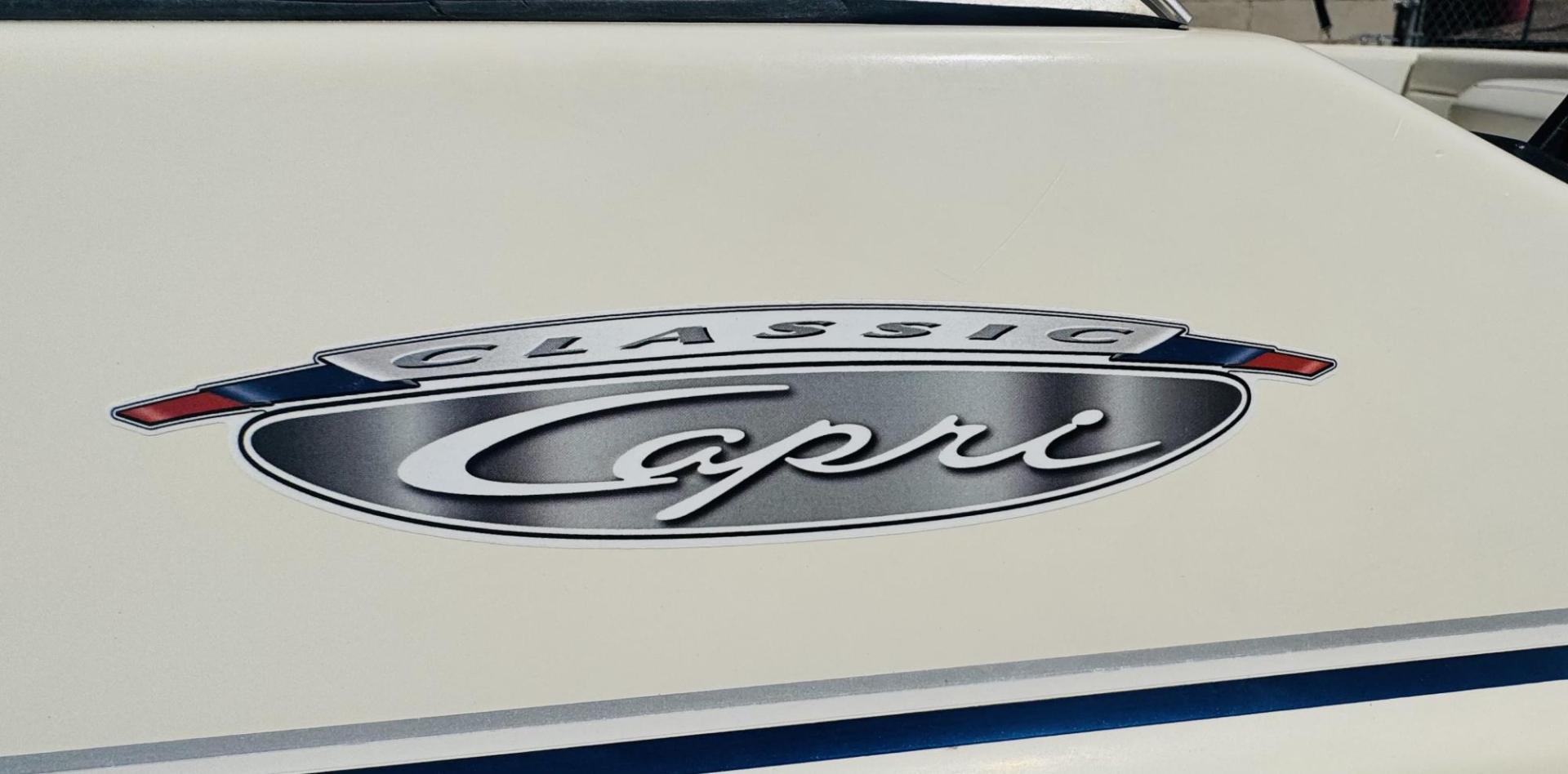 2001 White Bayliner Capri 190 , located at 2190 Hwy 95, Bullhead City, AZ, 86442, (928) 704-0060, 0.000000, 0.000000 - 2001 Bayliner Capri 1950 classic. Super clean 3.0 Mercruiser. recently serviced. seats up to 9. new bimini top . new boat cover. Runs and drives great. recently serviced. full spare tire/rim for trailer. tags current. seats and interior super nice. great entry boat. rear swim deck. cd player. - Photo#3