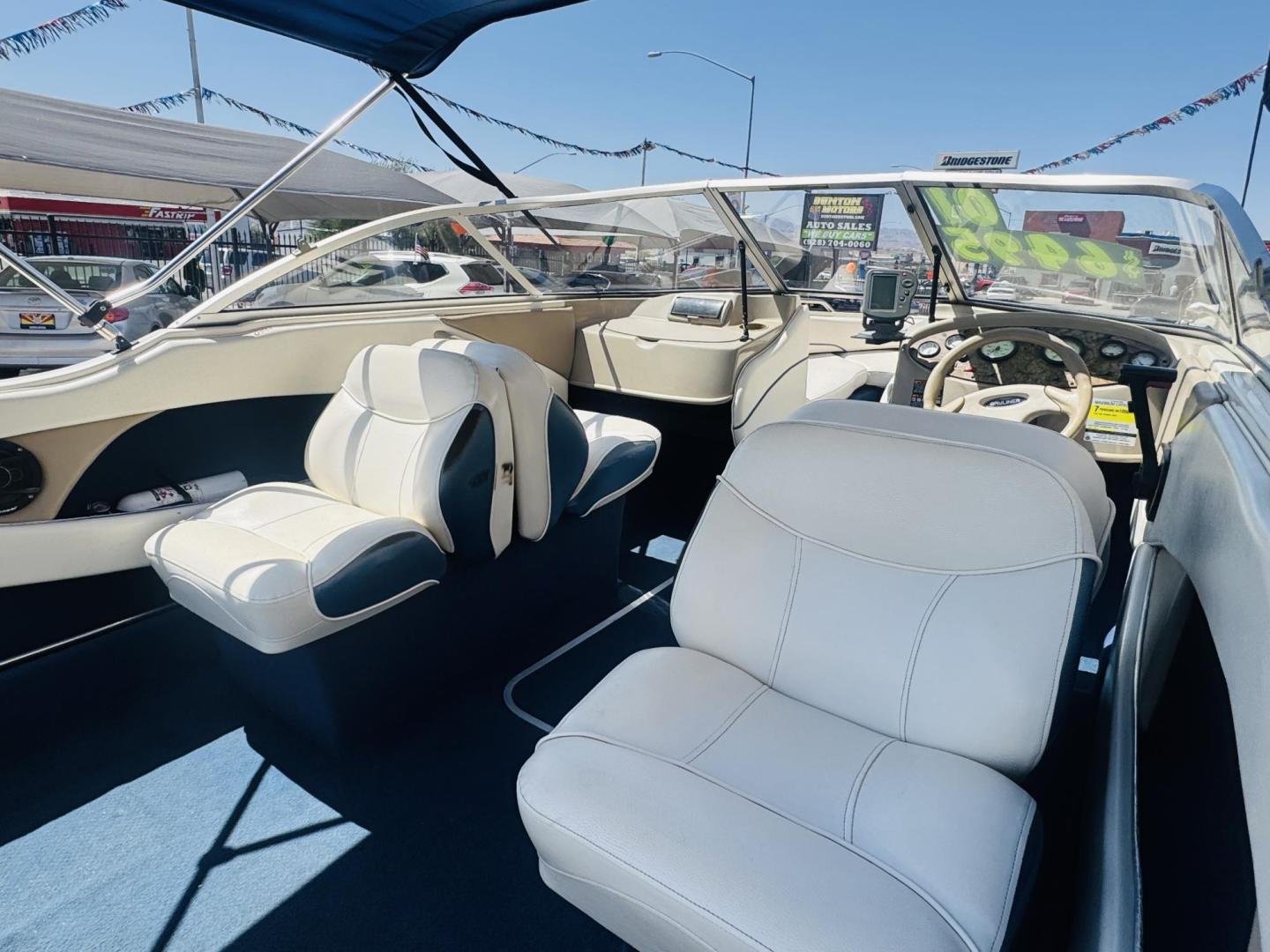 2001 White Bayliner Capri 190 , located at 2190 Hwy 95, Bullhead City, AZ, 86442, (928) 704-0060, 0.000000, 0.000000 - 2001 Bayliner Capri 1950 classic. Super clean 3.0 Mercruiser. recently serviced. seats up to 9. new bimini top . new boat cover. Runs and drives great. recently serviced. full spare tire/rim for trailer. tags current. seats and interior super nice. great entry boat. rear swim deck. cd player. - Photo#8
