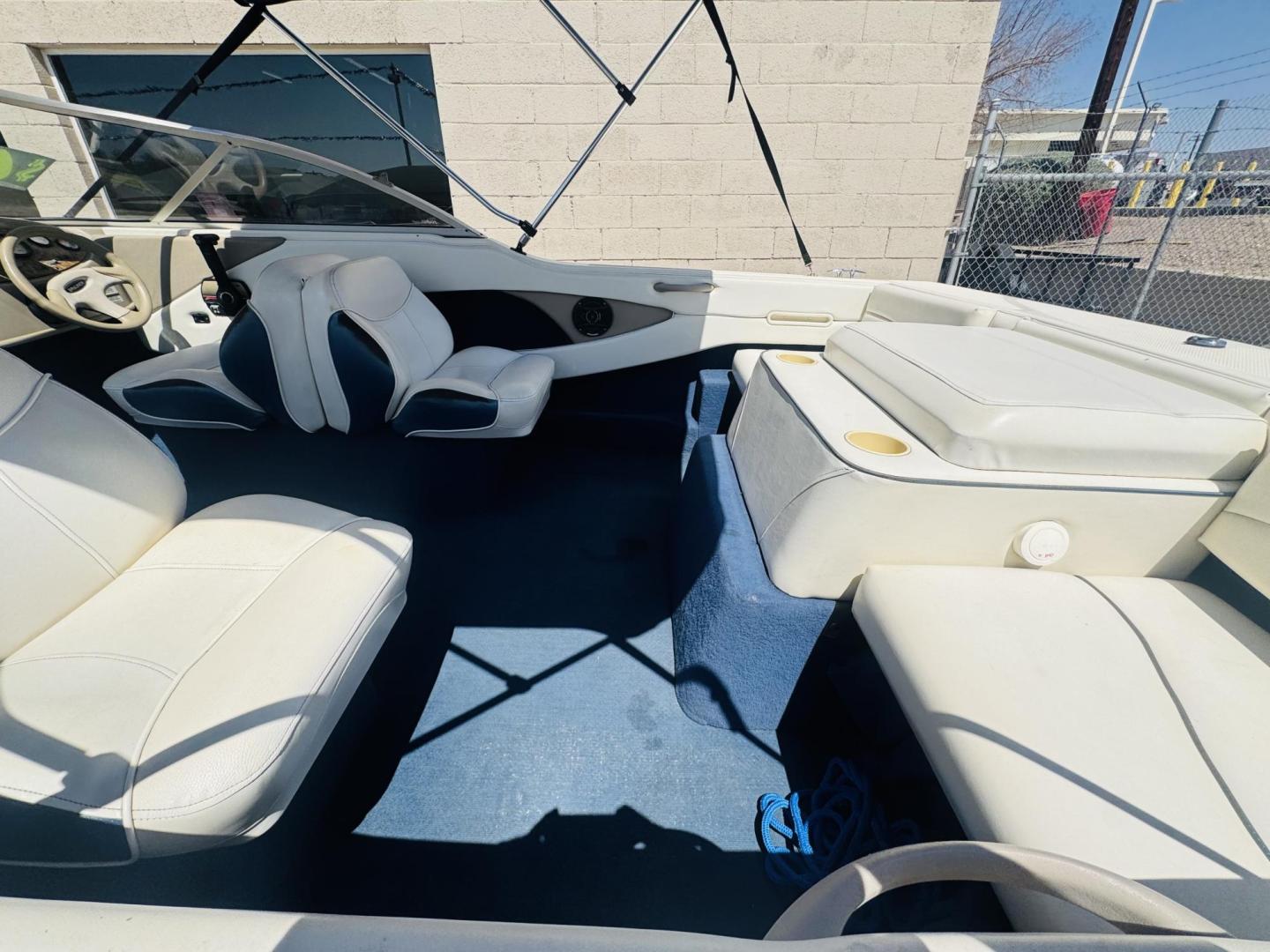2001 White Bayliner Capri 190 , located at 2190 Hwy 95, Bullhead City, AZ, 86442, (928) 704-0060, 0.000000, 0.000000 - 2001 Bayliner Capri 1950 classic. Super clean 3.0 Mercruiser. recently serviced. seats up to 9. new bimini top . new boat cover. Runs and drives great. recently serviced. full spare tire/rim for trailer. tags current. seats and interior super nice. great entry boat. rear swim deck. cd player. - Photo#10
