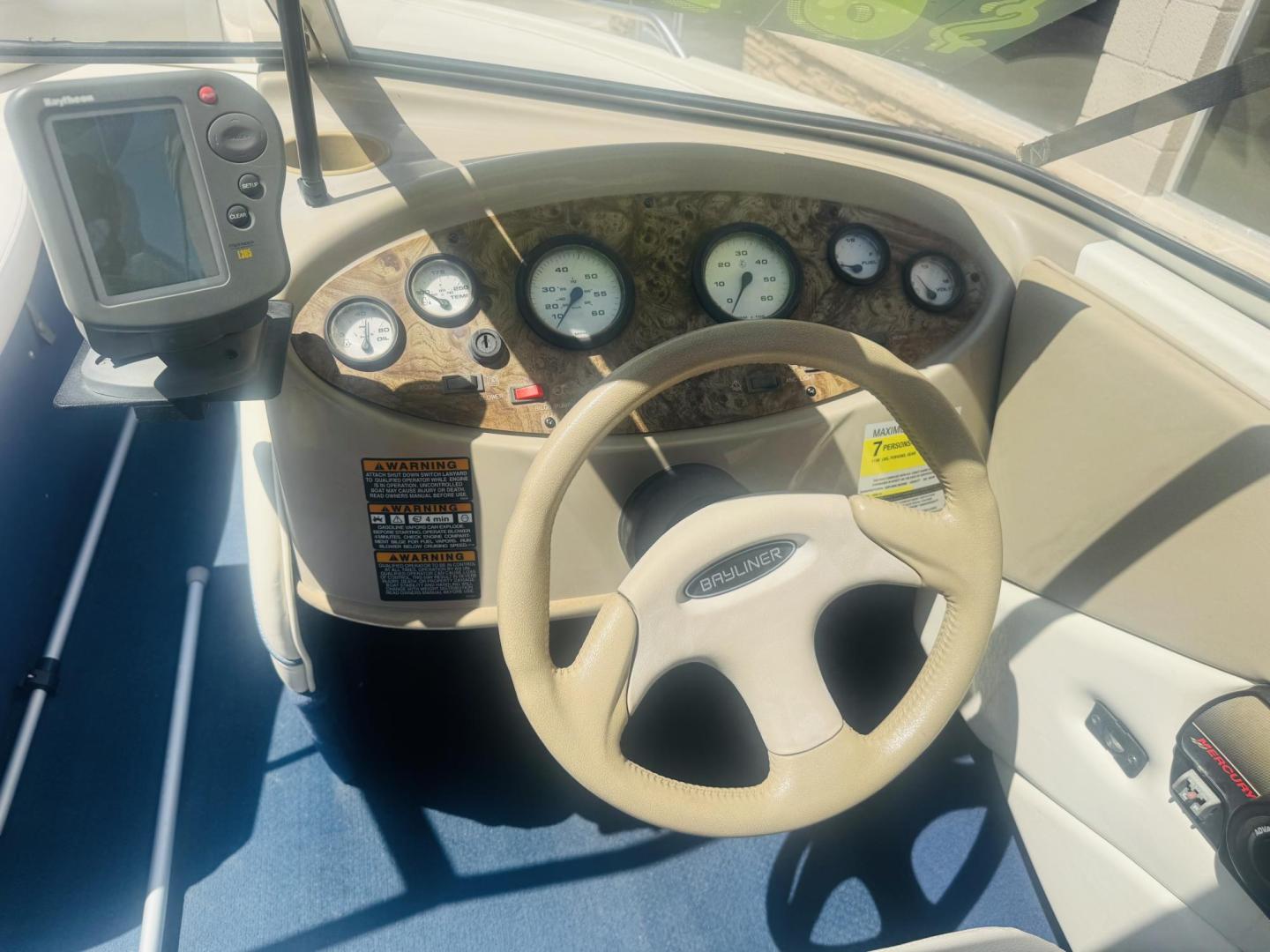 2001 White Bayliner Capri 190 , located at 2190 Hwy 95, Bullhead City, AZ, 86442, (928) 704-0060, 0.000000, 0.000000 - 2001 Bayliner Capri 1950 classic. Super clean 3.0 Mercruiser. recently serviced. seats up to 9. new bimini top . new boat cover. Runs and drives great. recently serviced. full spare tire/rim for trailer. tags current. seats and interior super nice. great entry boat. rear swim deck. cd player. - Photo#14