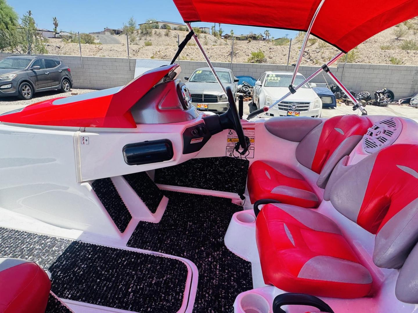 2011 /Red Seadoo Speedster , located at 2190 Hwy 95, Bullhead City, AZ, 86442, (928) 704-0060, 0.000000, 0.000000 - On consignment 2011 sea doo speedster 150only 111 hours . clean clean clean. nice bimini top. custom stereo. spare tire for trailer. always garaged. free and clear title. great running boat . new battery, recently serviced. needs nothing. 15 ft in length. 4 tech 4 stroke engine. Engine: Supercharged - Photo#3