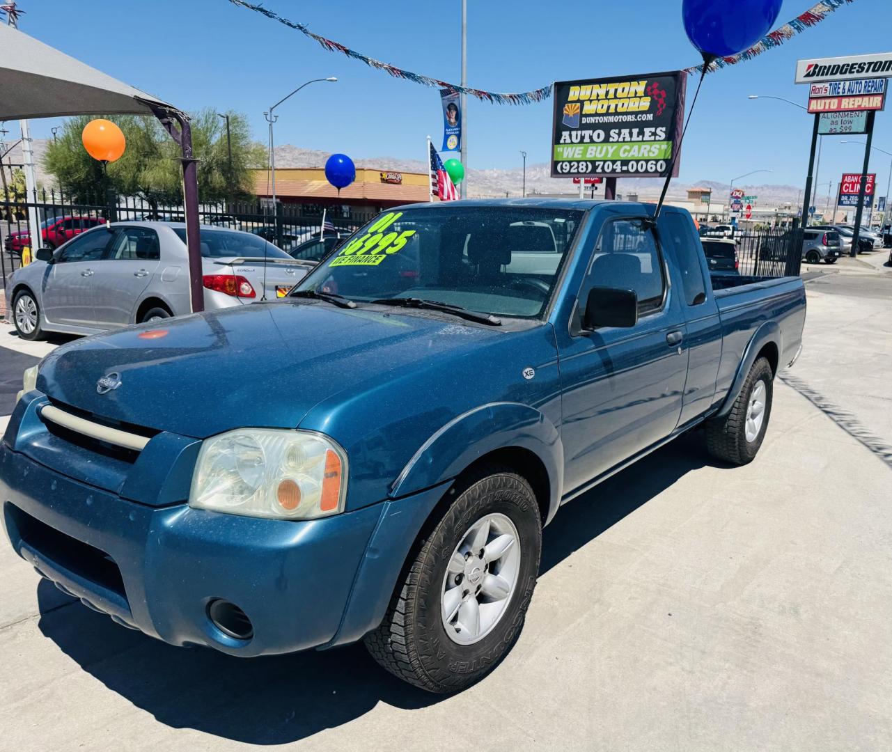 2001 Teal /Grey Nissan Frontier XE King Cab , located at 2190 Hwy 95, Bullhead City, AZ, 86442, (928) 704-0060, 0.000000, 0.000000 - 2001 NIssan Frontier truck. king cab. 2 wd. manual transmission. New transmission with warranty. brand new tires. 141k miles on engine. Runs and drives great. Ice cold AC. in house financing available. all new ac system. new compressor, dryer , condensor etc. free warranty on truck and a/c system. - Photo#1