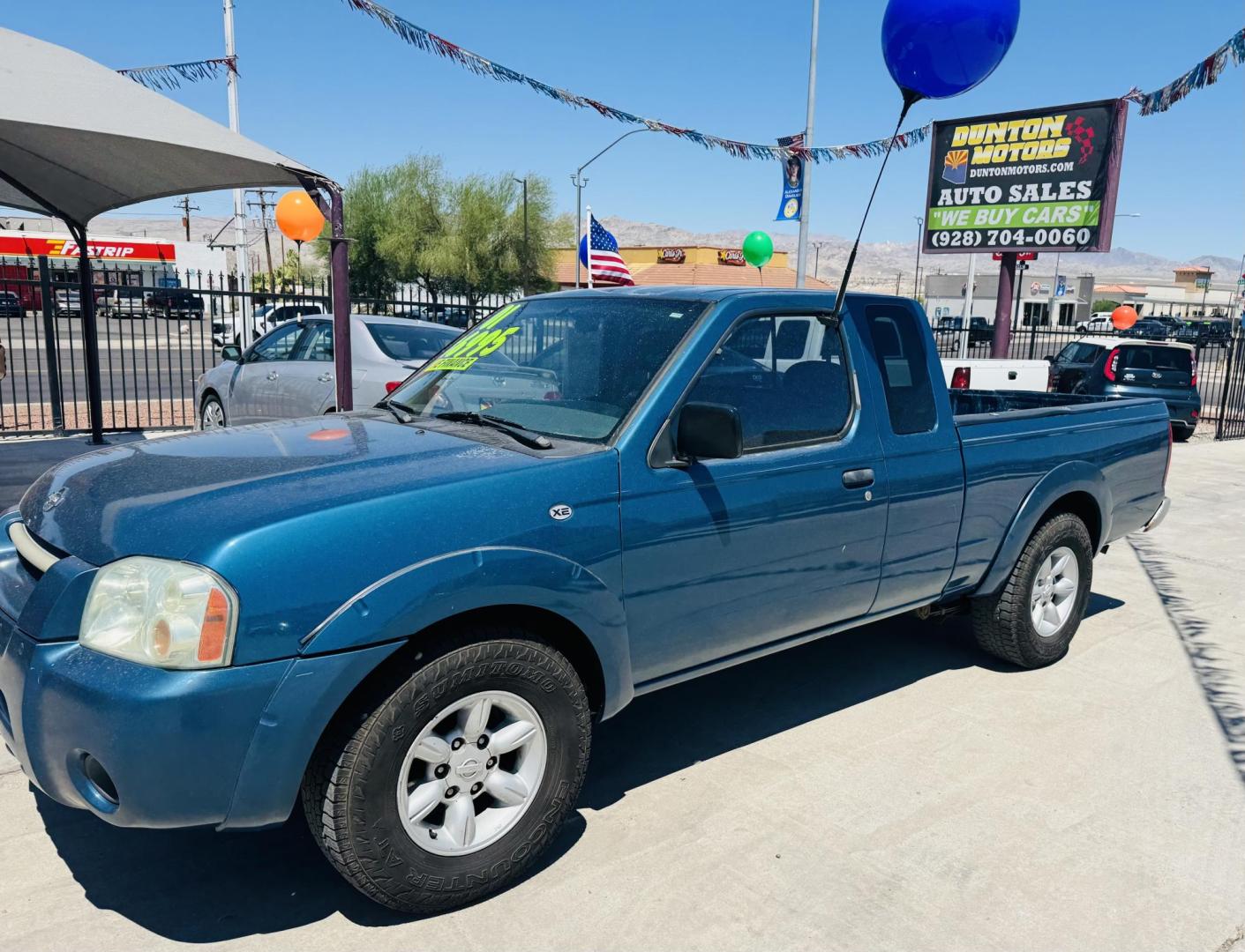 2001 Teal /Grey Nissan Frontier XE King Cab , located at 2190 Hwy 95, Bullhead City, AZ, 86442, (928) 704-0060, 0.000000, 0.000000 - 2001 NIssan Frontier truck. king cab. 2 wd. manual transmission. New transmission with warranty. brand new tires. 141k miles on engine. Runs and drives great. Ice cold AC. in house financing available. all new ac system. new compressor, dryer , condensor etc. free warranty on truck and a/c system. - Photo#3