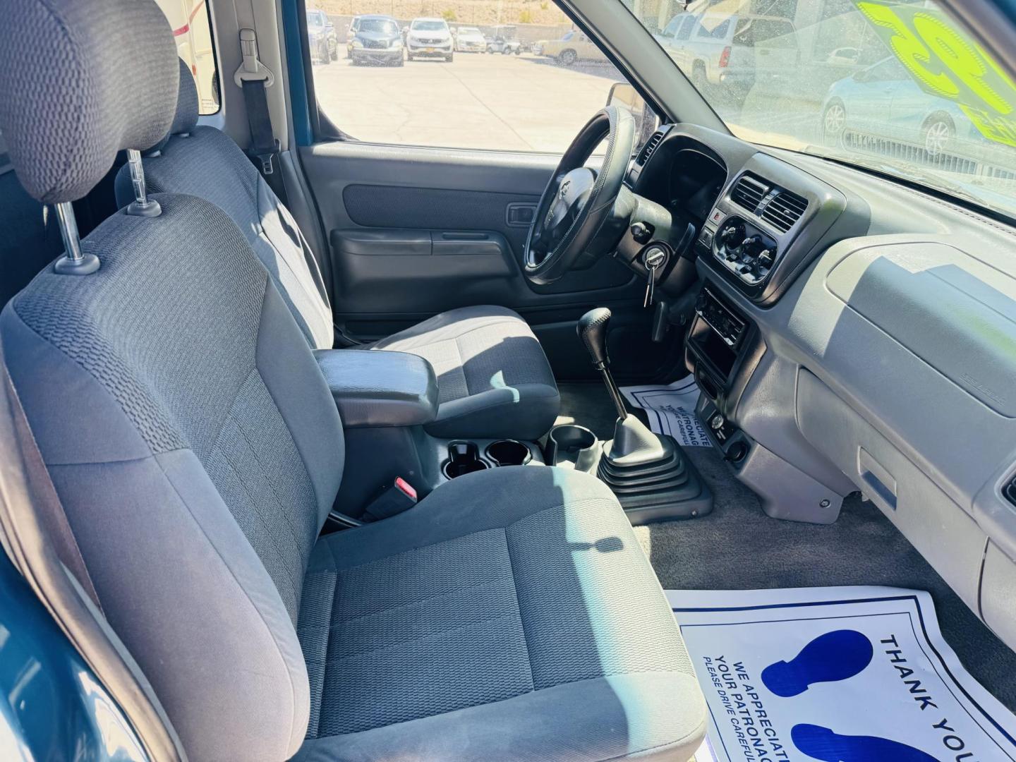 2001 Teal /Grey Nissan Frontier XE King Cab , located at 2190 Hwy 95, Bullhead City, AZ, 86442, (928) 704-0060, 0.000000, 0.000000 - 2001 NIssan Frontier truck. king cab. 2 wd. manual transmission. New transmission with warranty. brand new tires. 141k miles on engine. Runs and drives great. Ice cold AC. in house financing available. all new ac system. new compressor, dryer , condensor etc. free warranty on truck and a/c system. - Photo#10