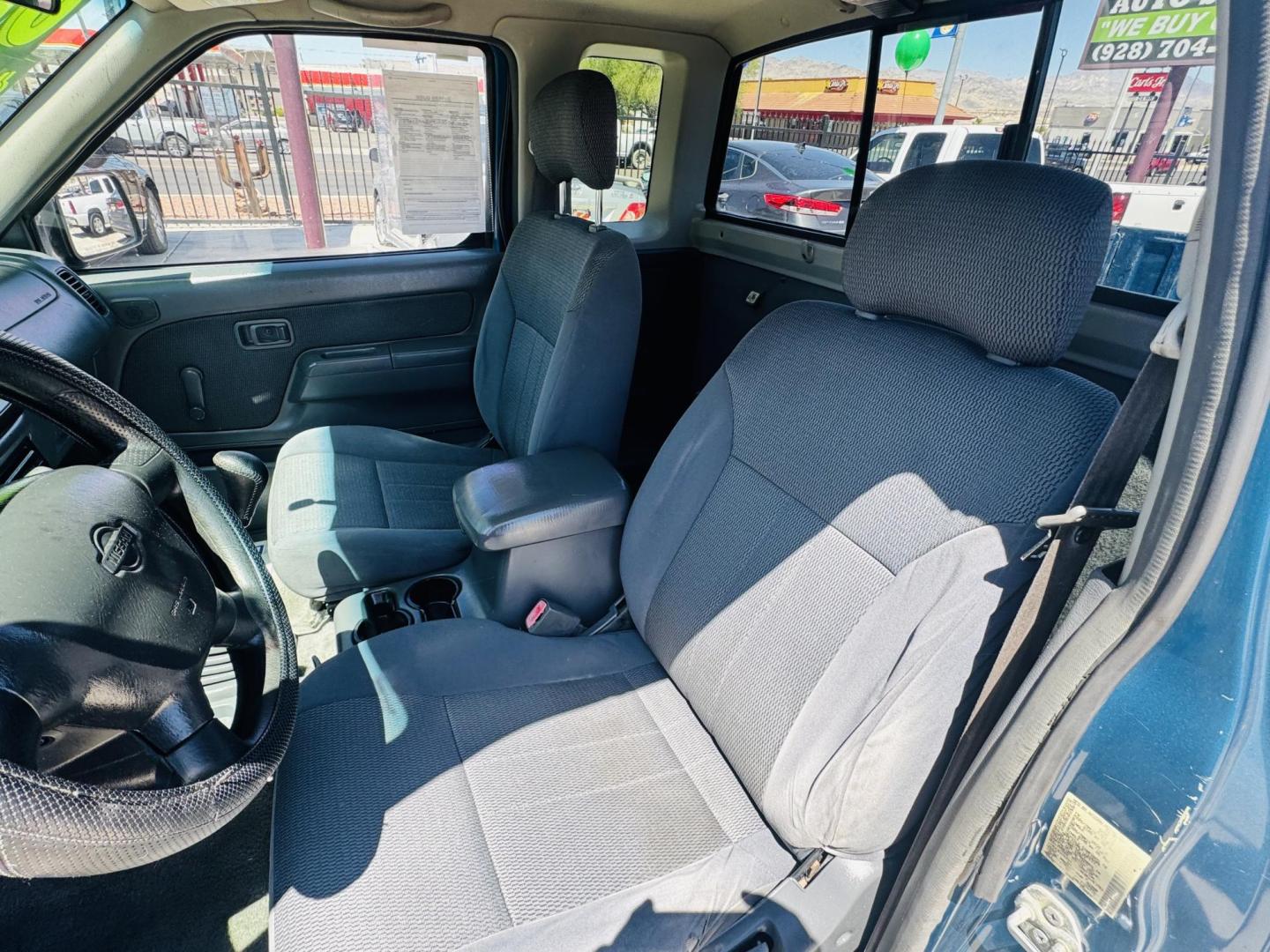 2001 Teal /Grey Nissan Frontier XE King Cab , located at 2190 Hwy 95, Bullhead City, AZ, 86442, (928) 704-0060, 0.000000, 0.000000 - 2001 NIssan Frontier truck. king cab. 2 wd. manual transmission. New transmission with warranty. brand new tires. 141k miles on engine. Runs and drives great. Ice cold AC. in house financing available. all new ac system. new compressor, dryer , condensor etc. free warranty on truck and a/c system. - Photo#14