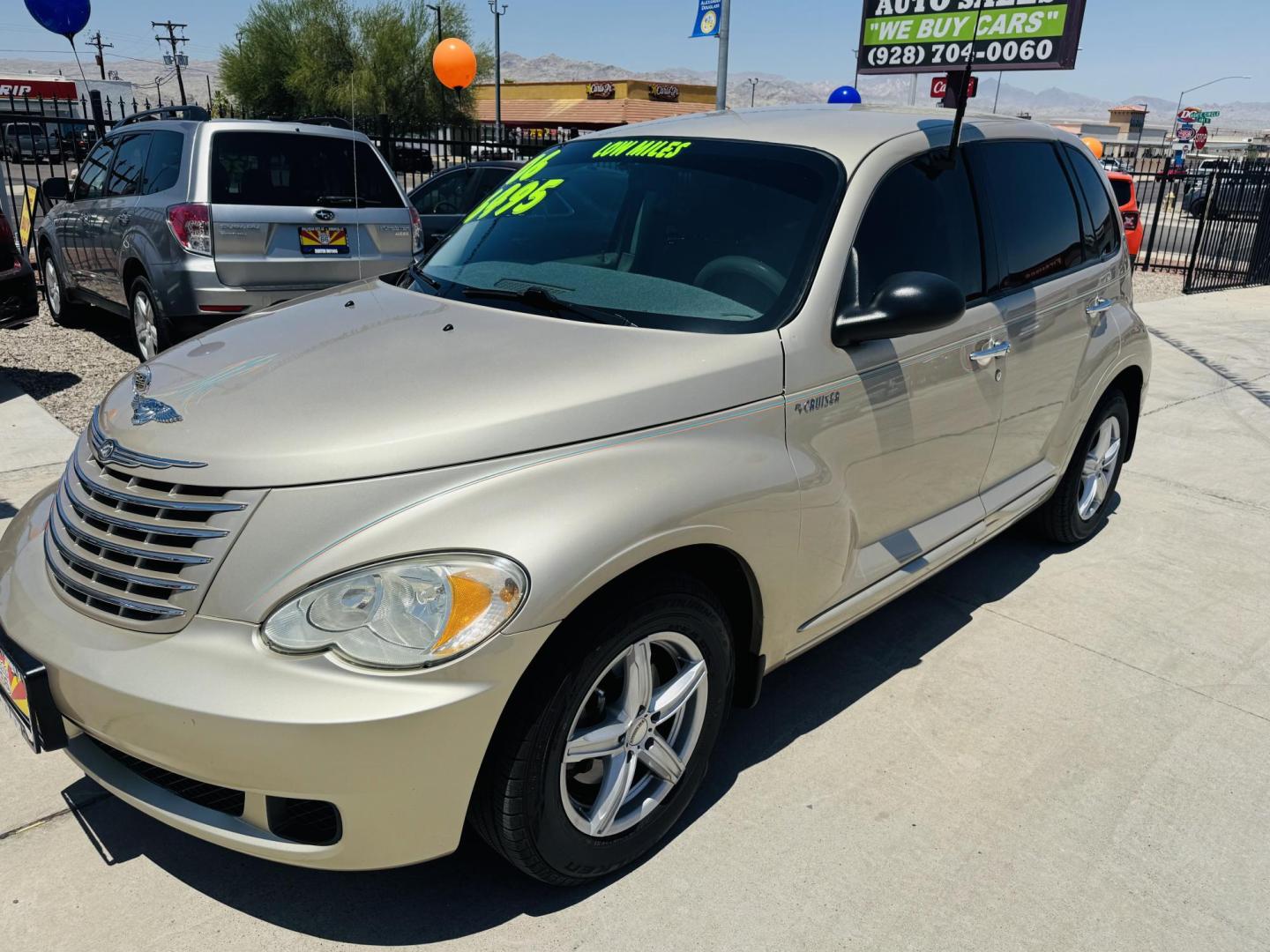 2006 Gold Chrysler PT Cruiser Touring Edition (3A4FY58B76T) with an 2.4L L4 DOHC 16V engine, located at 2190 Hwy 95, Bullhead City, AZ, 86442, (928) 704-0060, 0.000000, 0.000000 - super clean best of show pt cruiser. 2006 touring edition. brand new tires/wheels. serpentine belts been replaced. elderly owned. great running car. needs nothing. - Photo#1