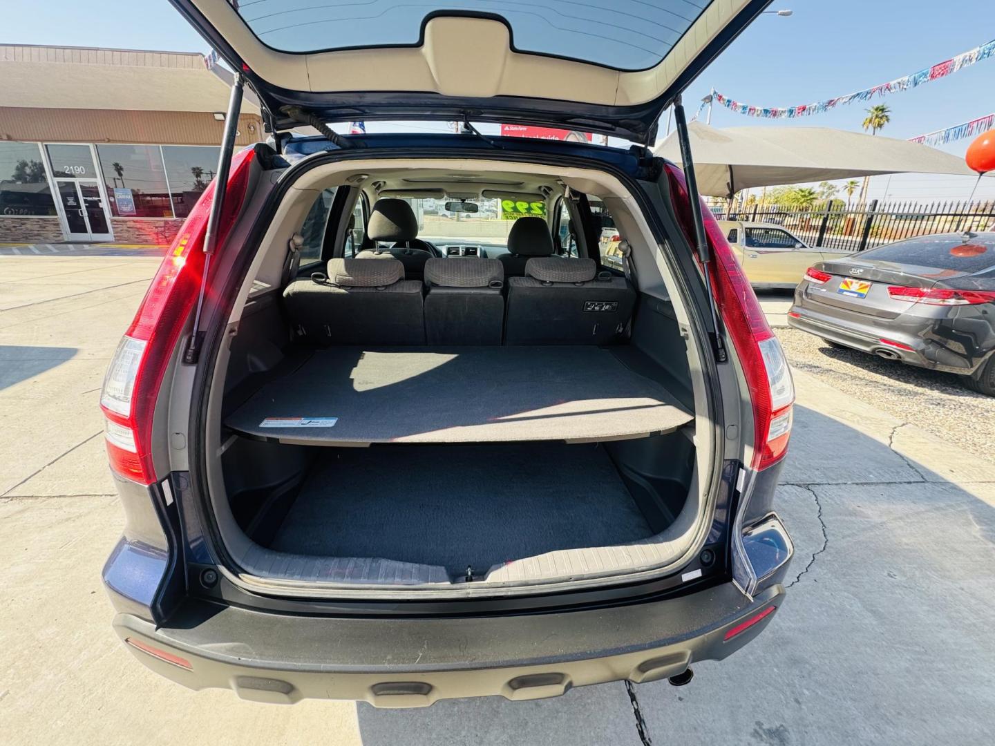 2009 blue Honda CR-V EX 2WD 5-Speed AT (5J6RE38519L) with an 2.4L L4 DOHC 16V engine, 5-Speed Automatic transmission, located at 2190 Hwy 95, Bullhead City, AZ, 86442, (928) 704-0060, 0.000000, 0.000000 - 2009 Honda Cr-V. 1 owner. free carfax. free warranty. IN house financing. Buy Here Pay Here. Greart running reliable car. - Photo#5